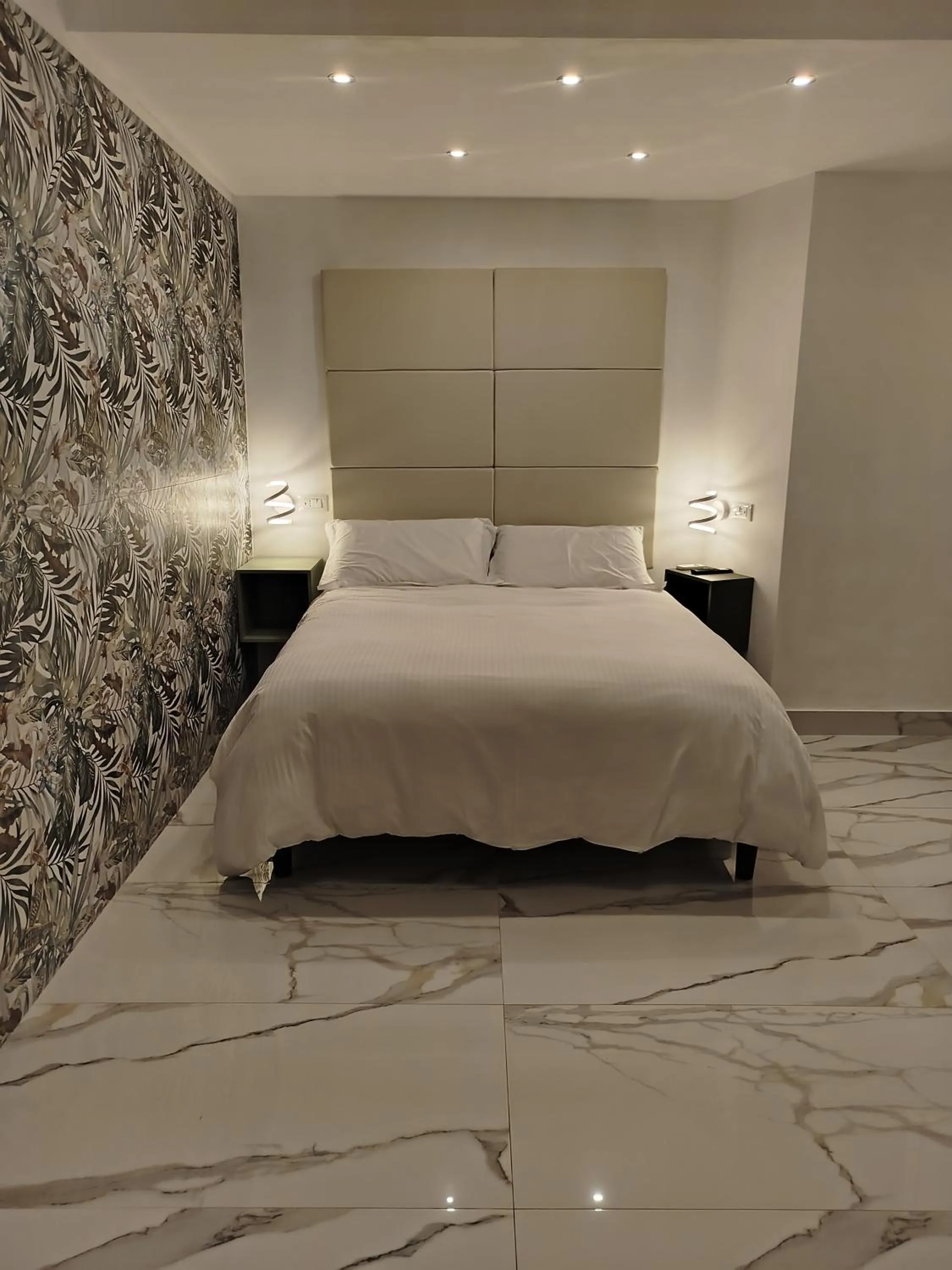 Bed in Confort Suites