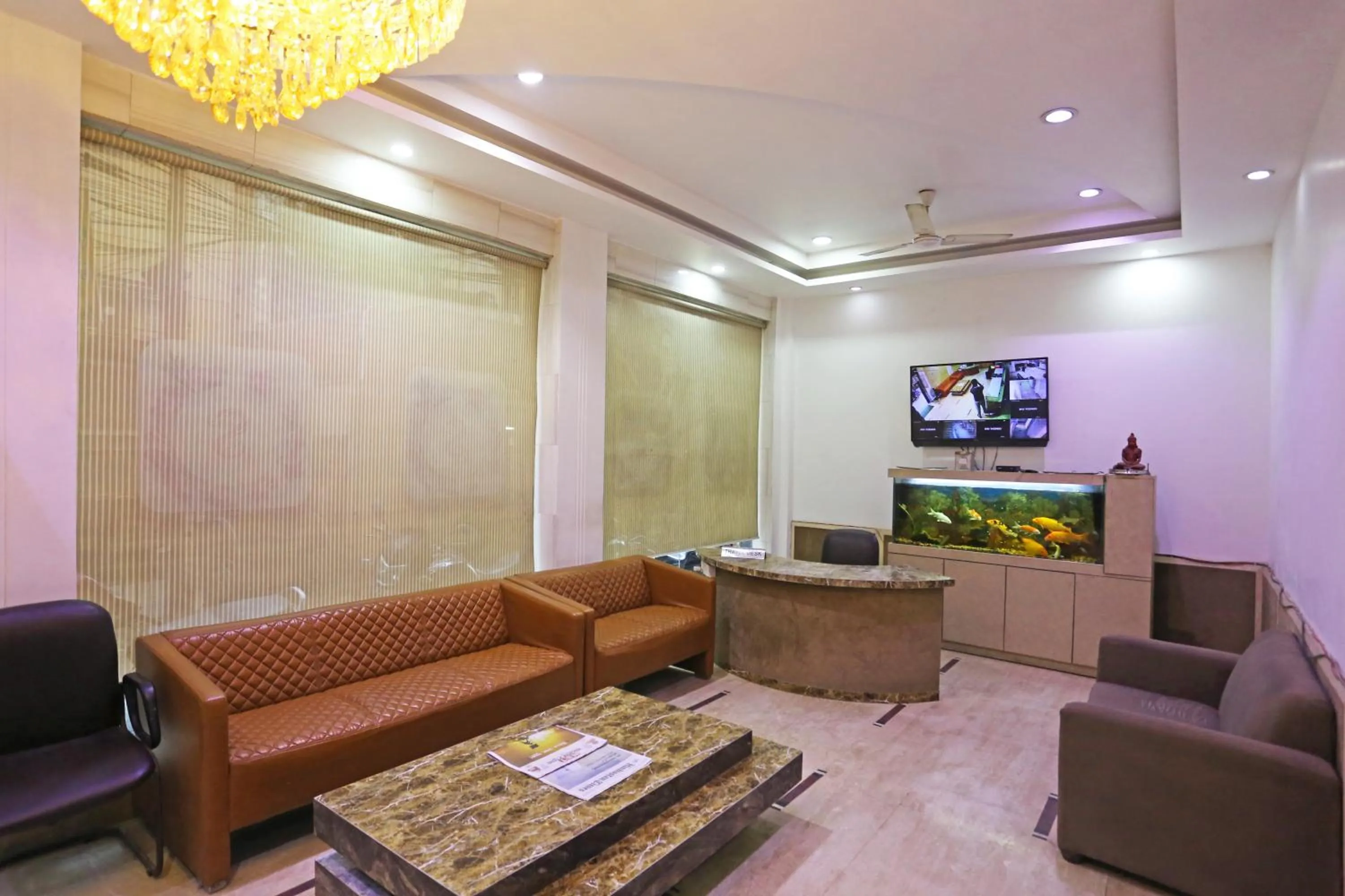 Seating area in Hotel Sterling Inn, New Delhi