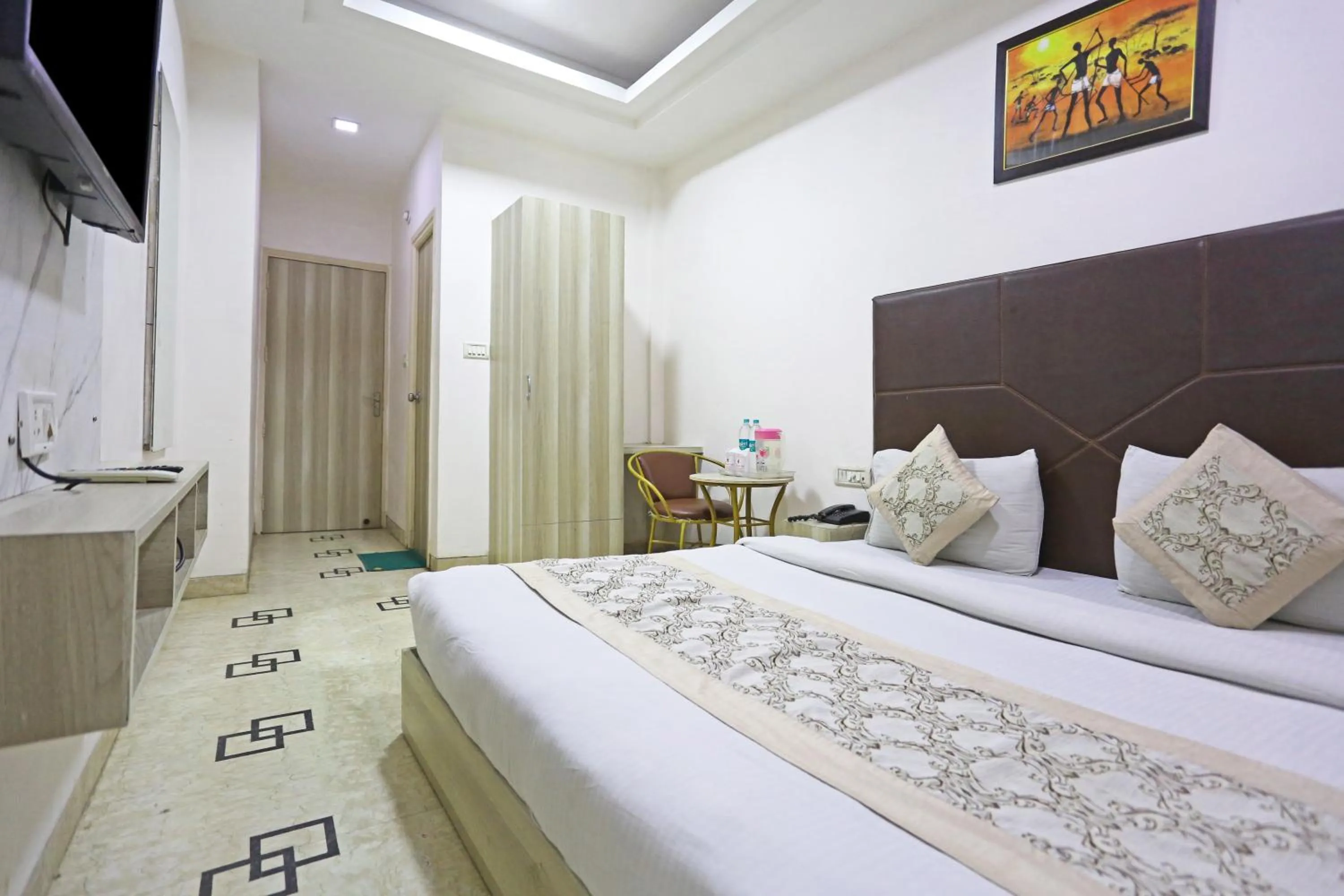 Bed in Hotel Sterling Inn, New Delhi