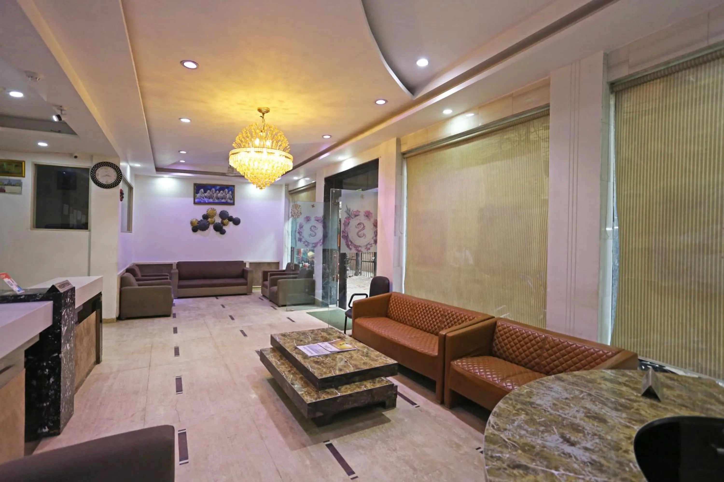 Seating area in Hotel Sterling Inn, New Delhi