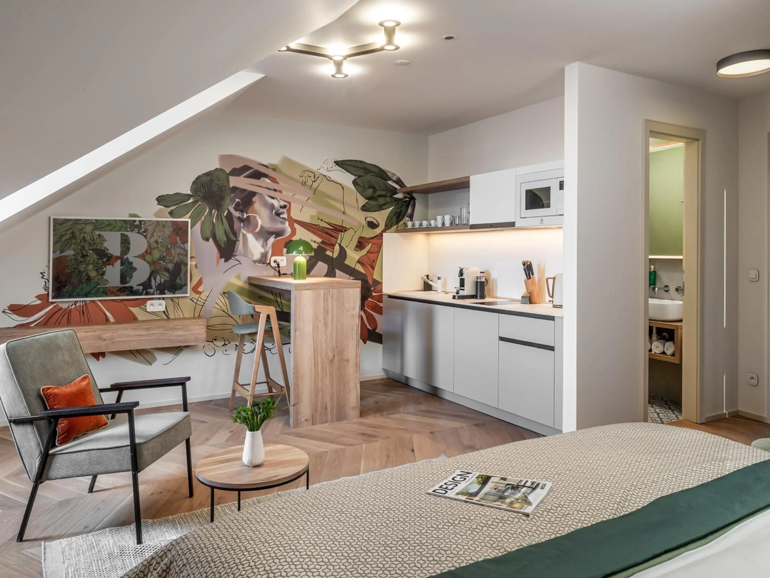 Kitchen or kitchenette in The Botanist by Adrez