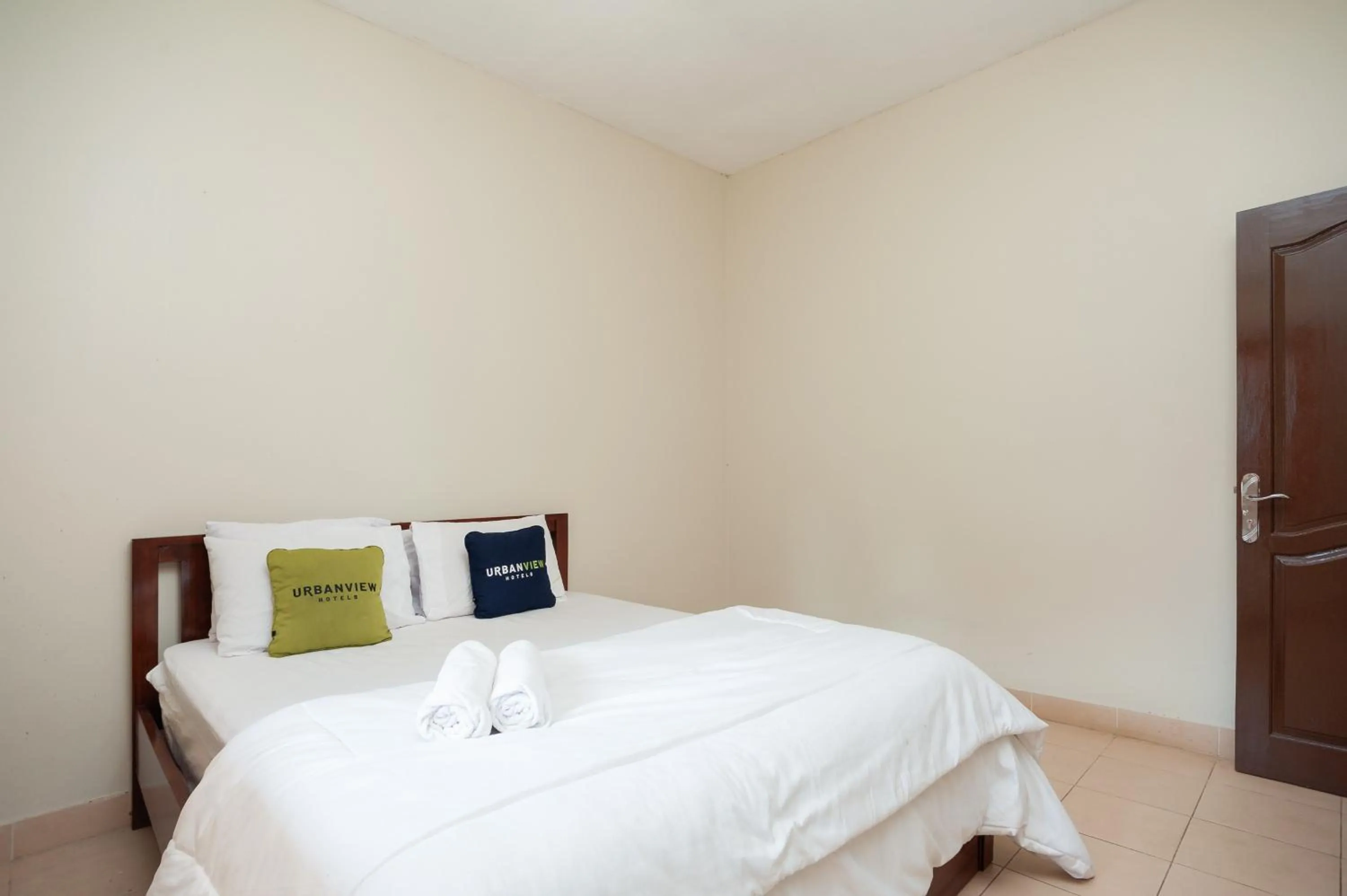 Bed in Urbanview Hotel Syariah Insani Cisarua Puncak