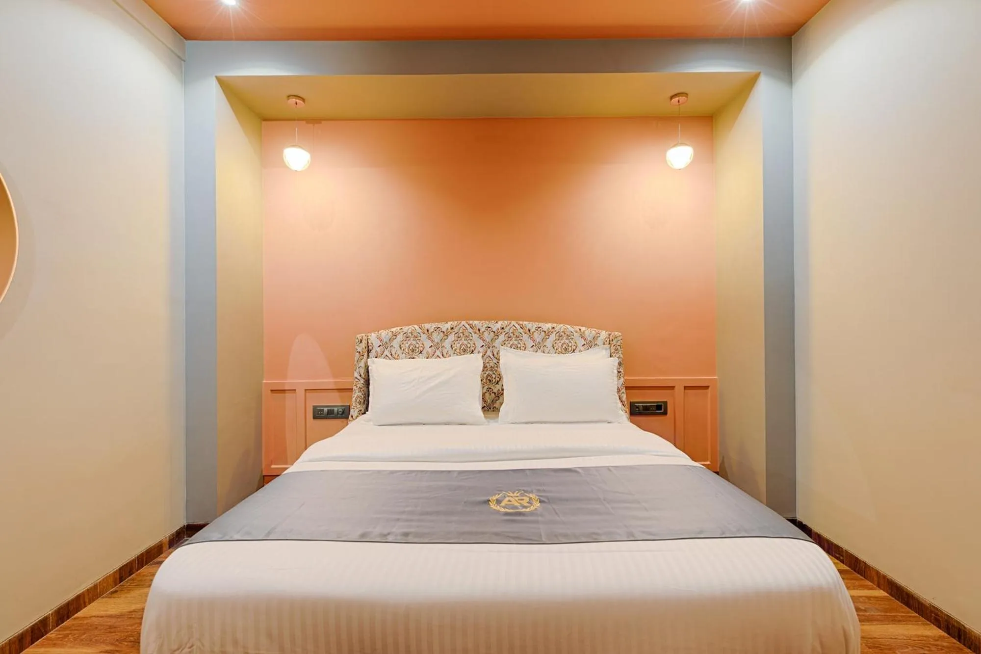 Bed in Hotel AR Residency