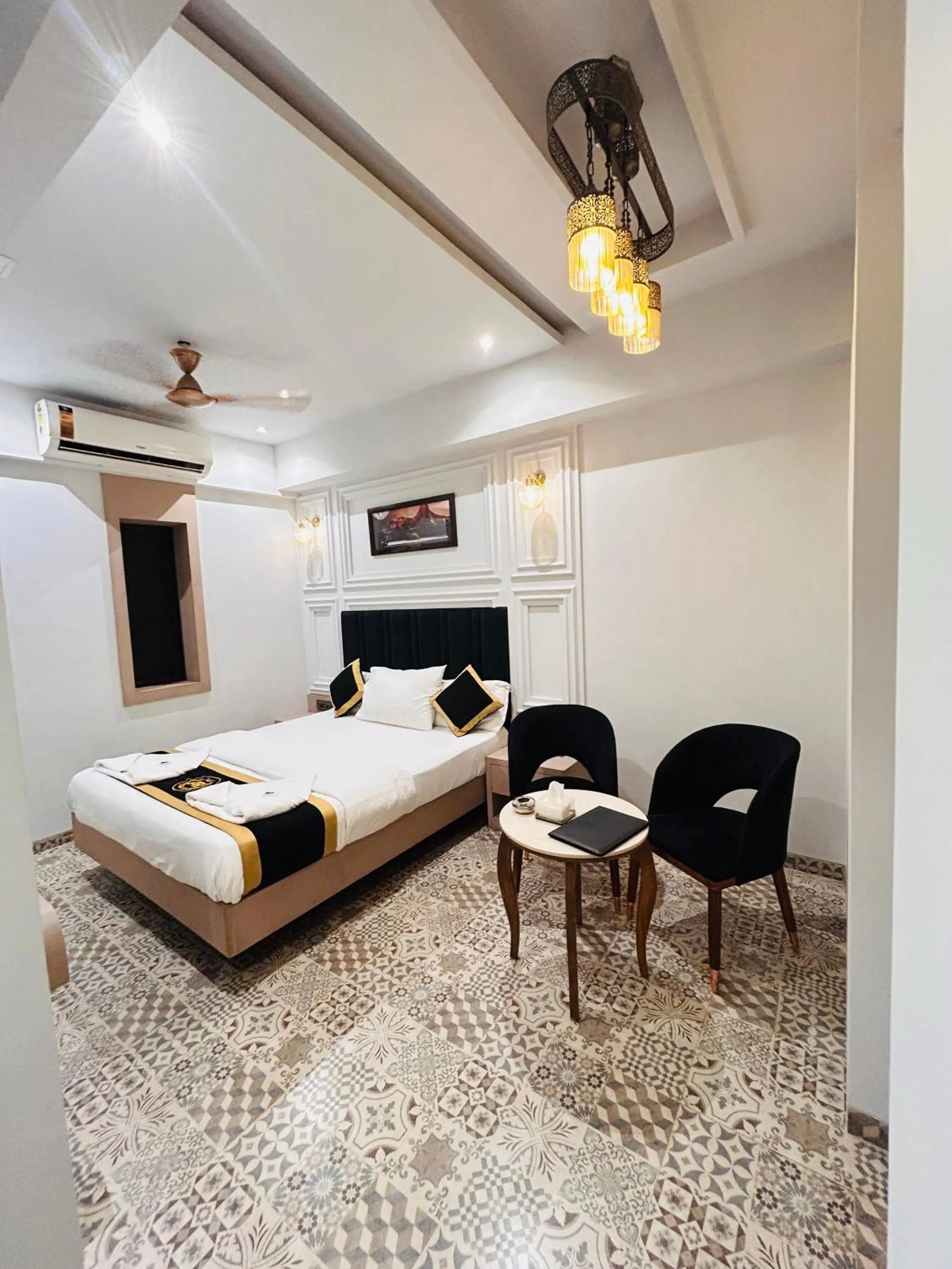 Bed in Hotel AR Residency