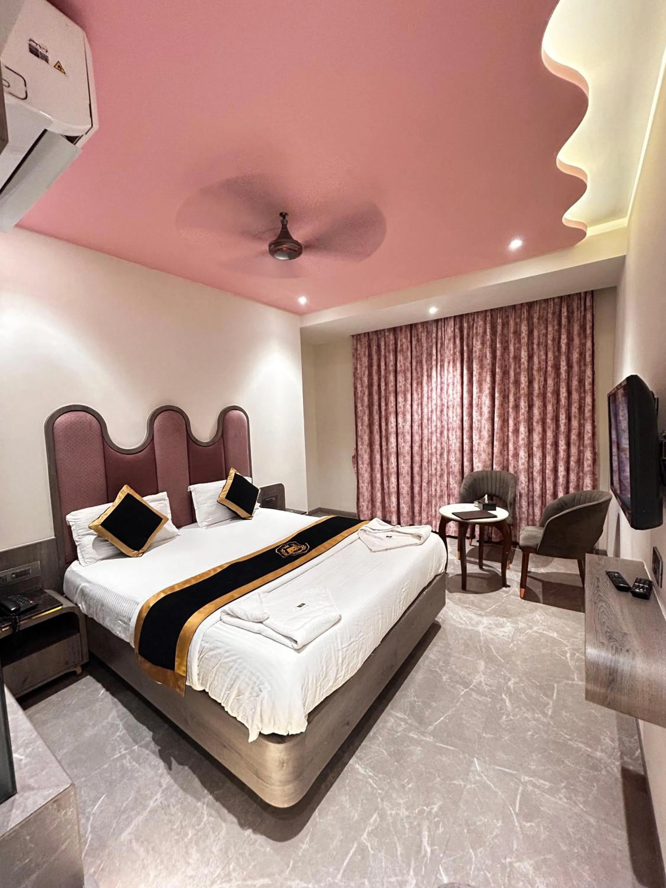 Bed in Hotel AR Residency