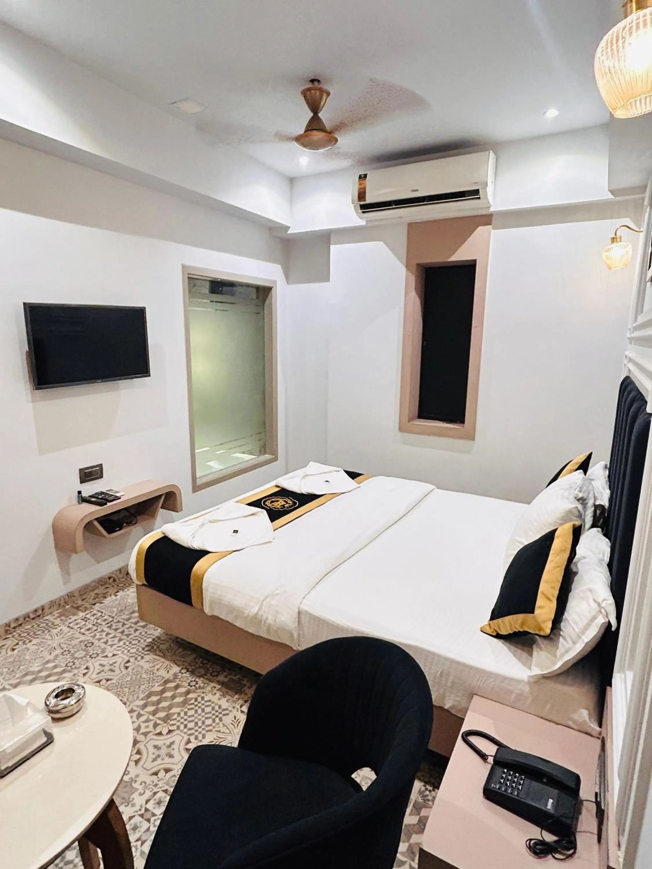 Bed in Hotel AR Residency