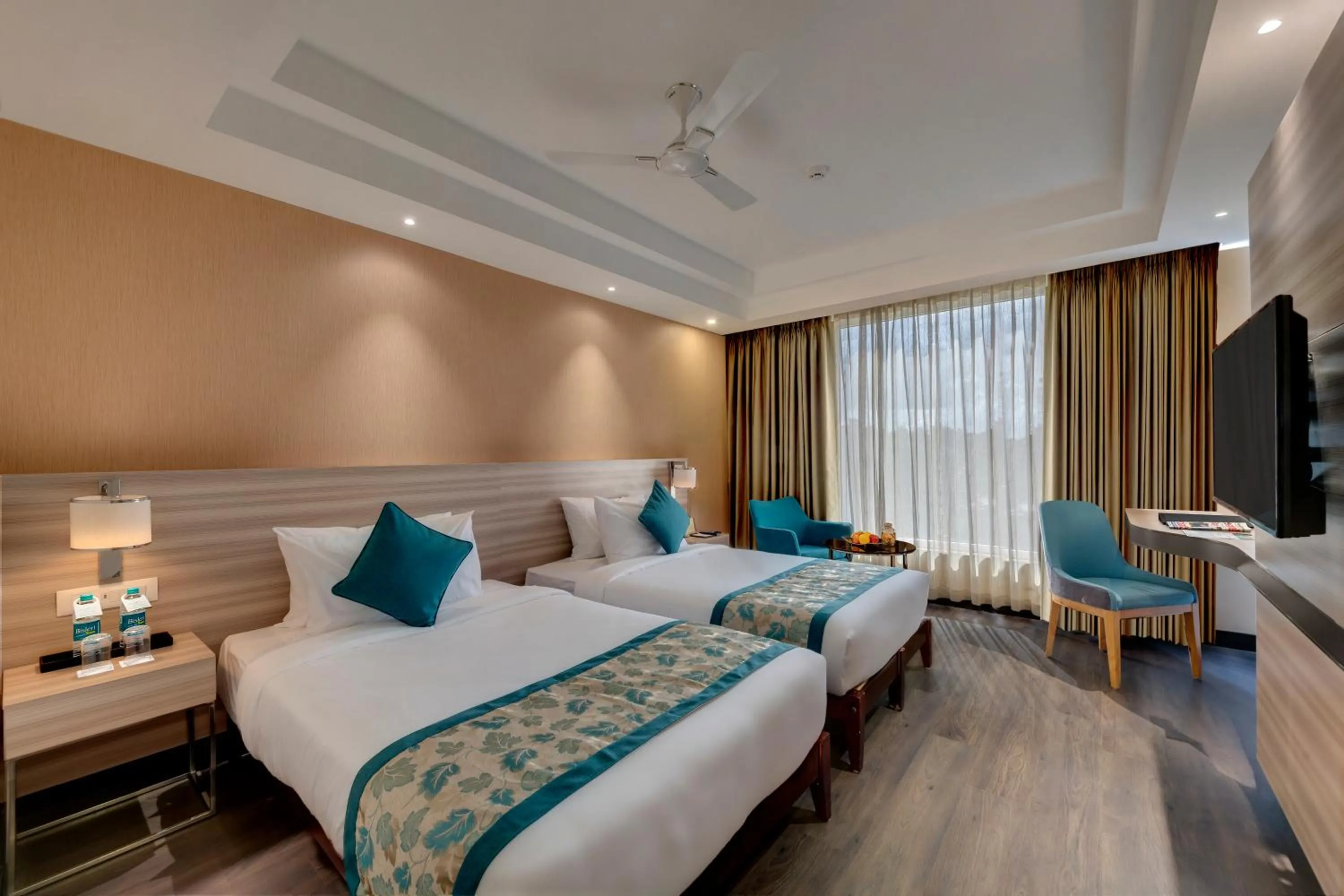 Bed in The Fern Residency Hubballi