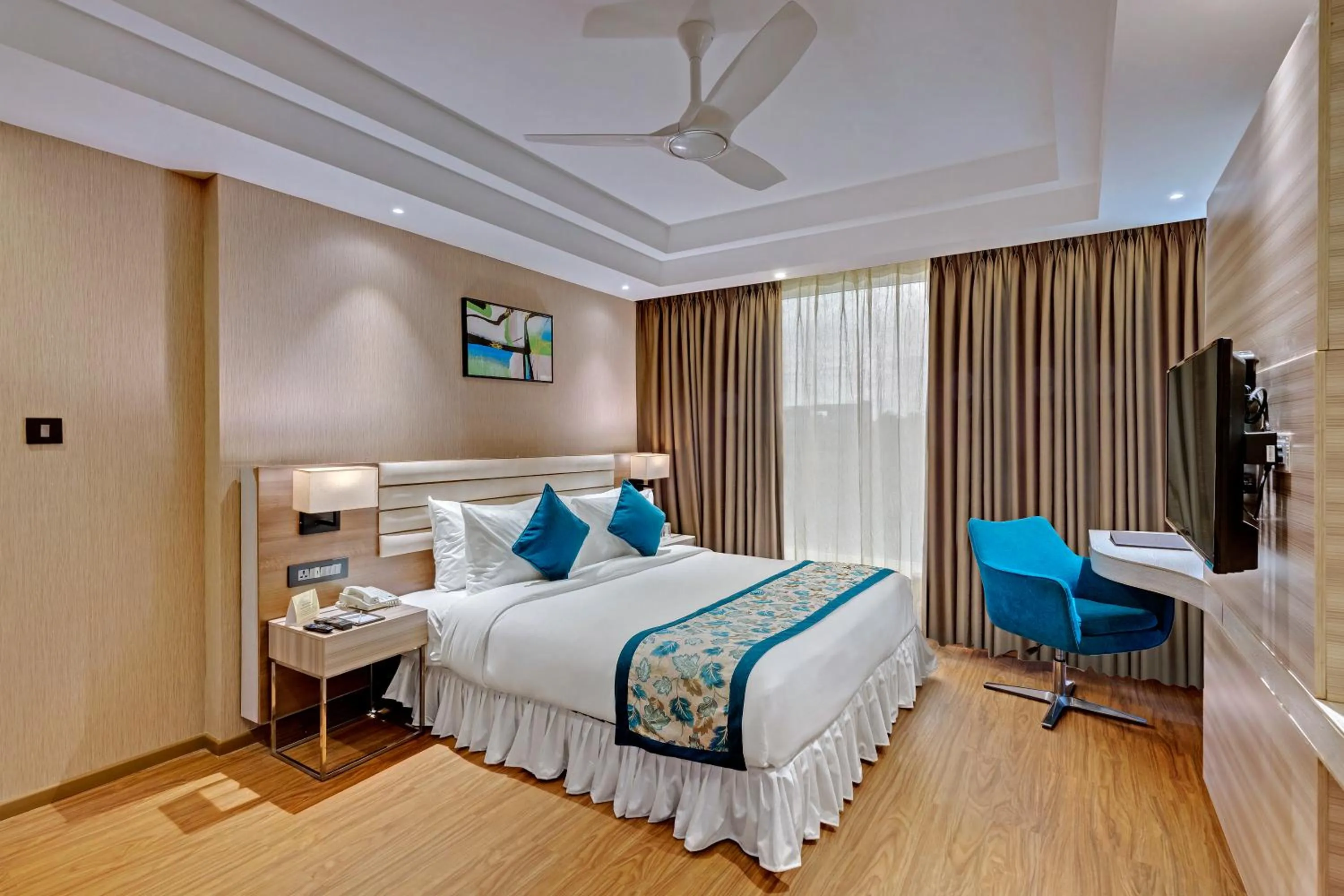 Bed in The Fern Residency Hubballi