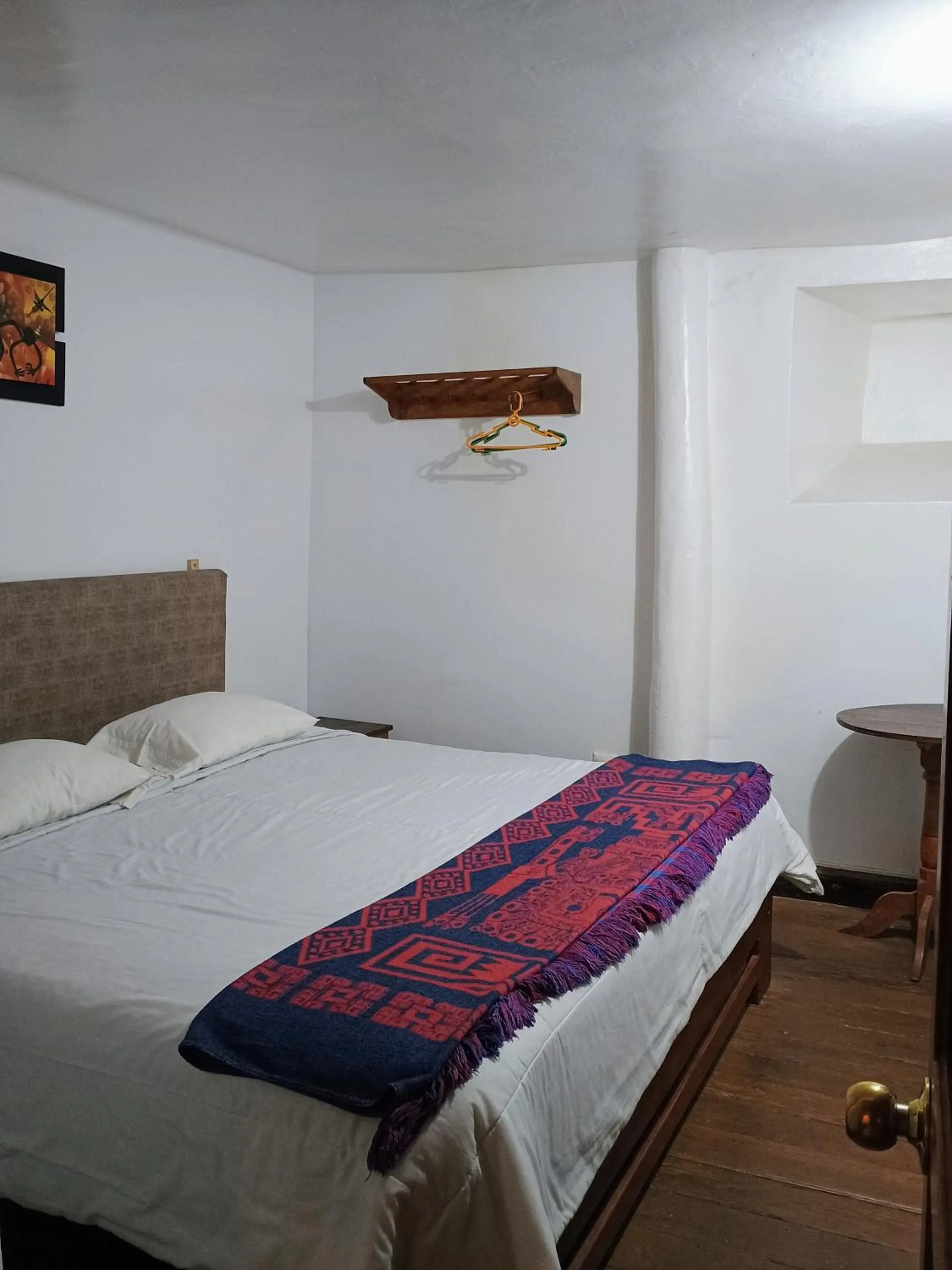 Bed in Posada Catama INN