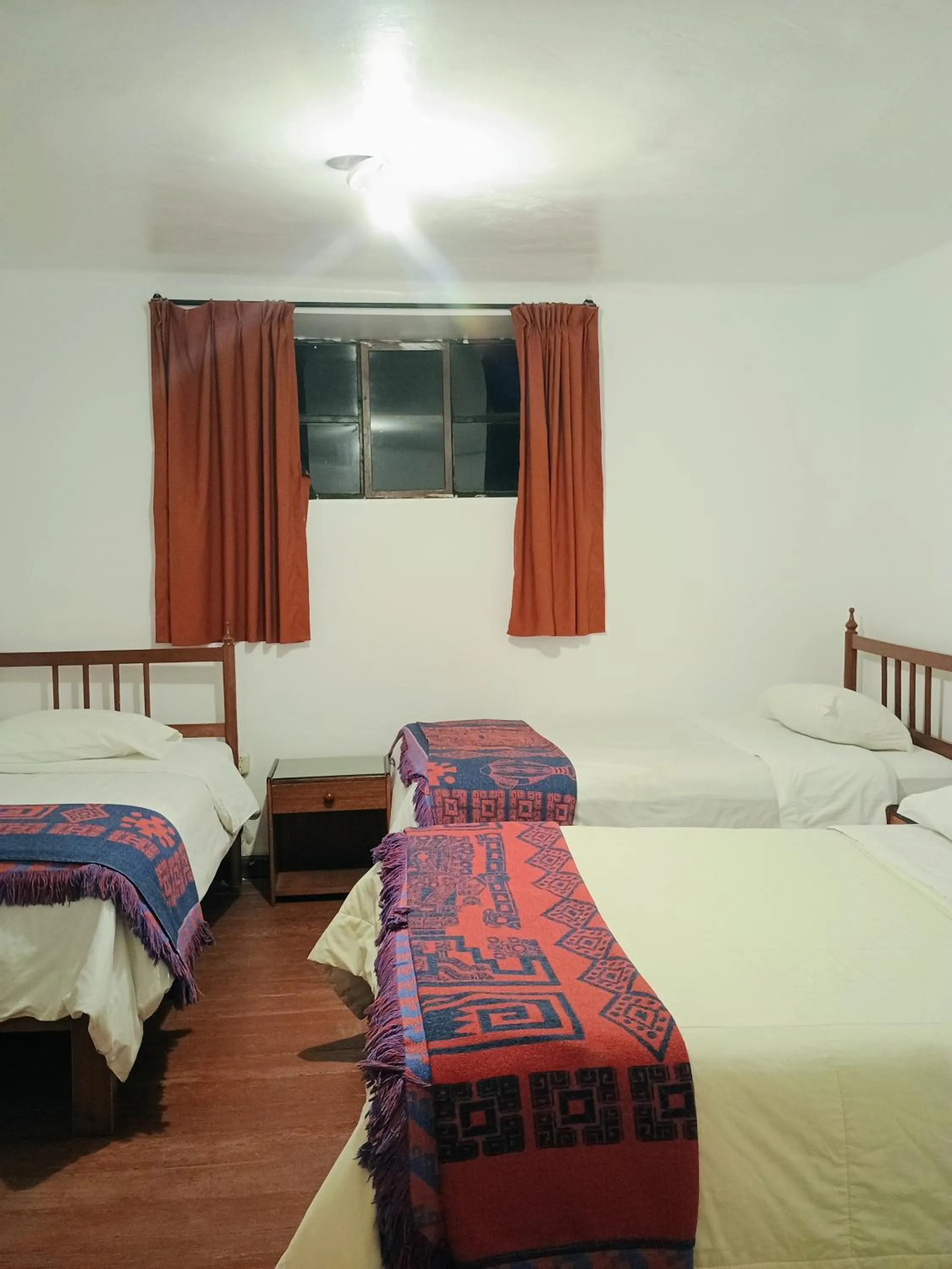 Bed in Posada Catama INN