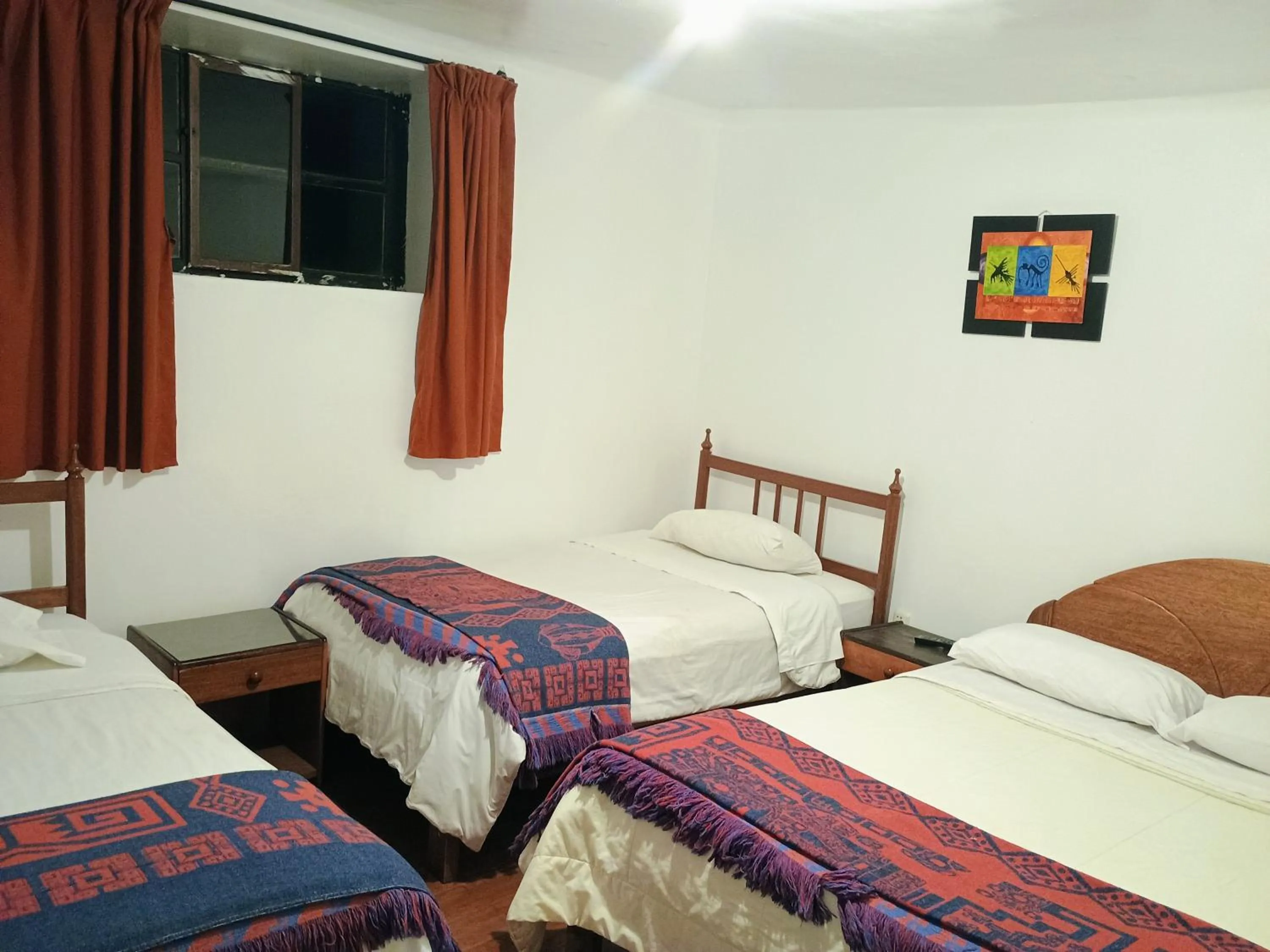 Bed in Posada Catama INN