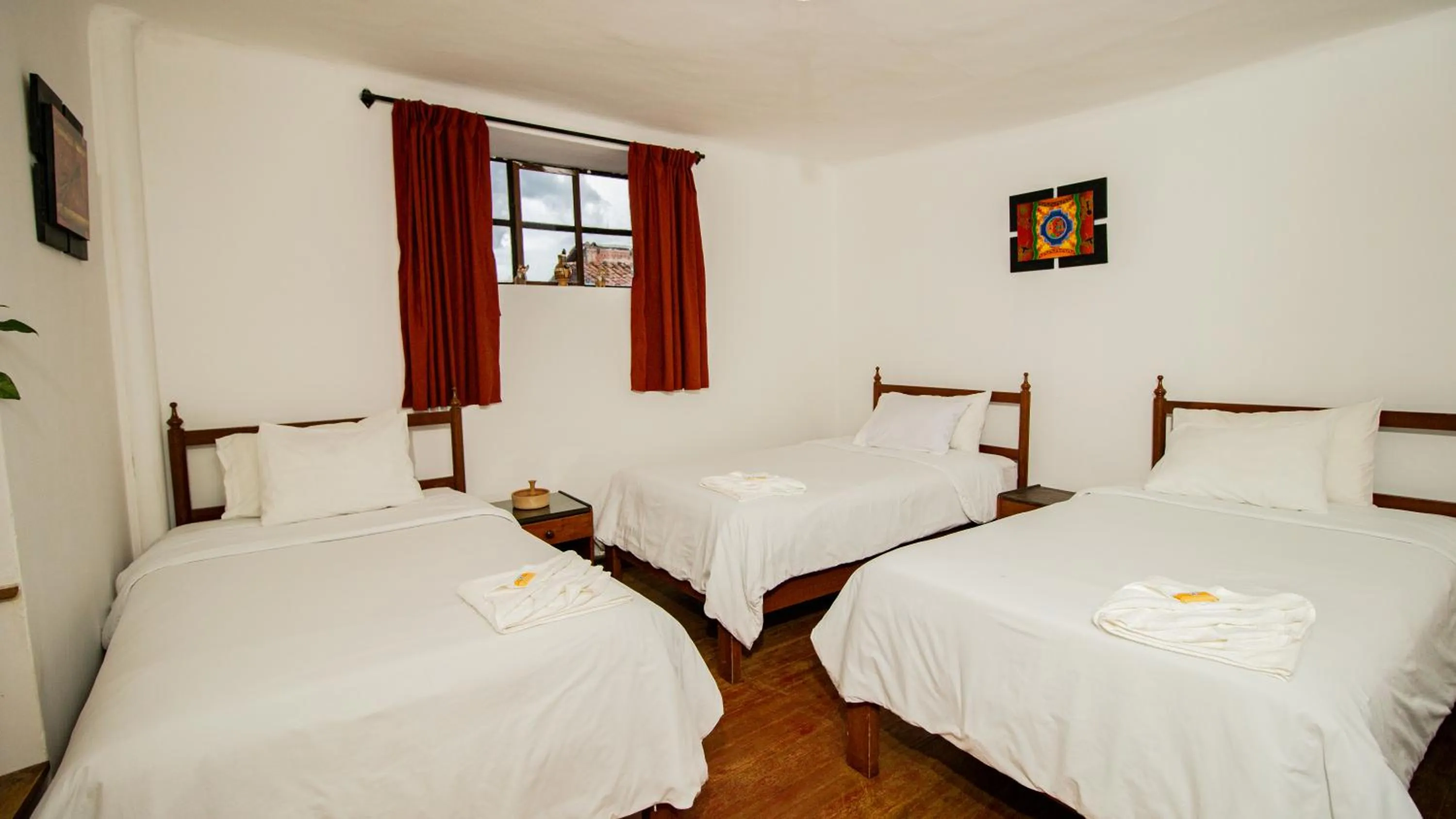 Bed in Posada Catama INN