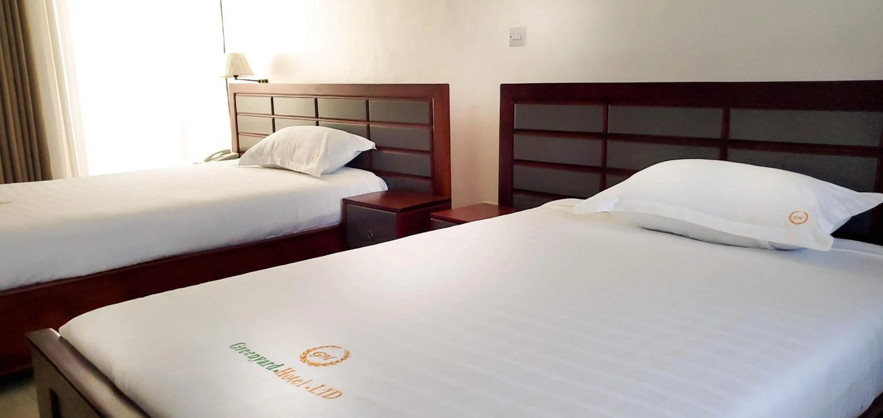 Bed in Greenyard Beach Hotel