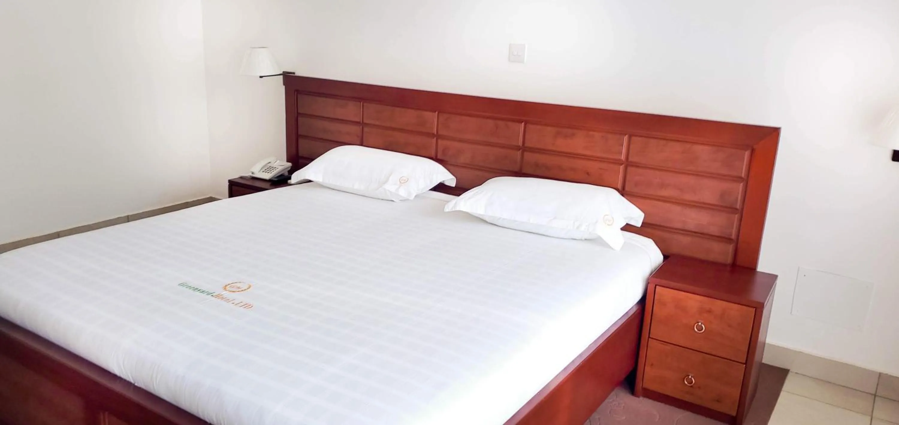 Bed in Greenyard Beach Hotel
