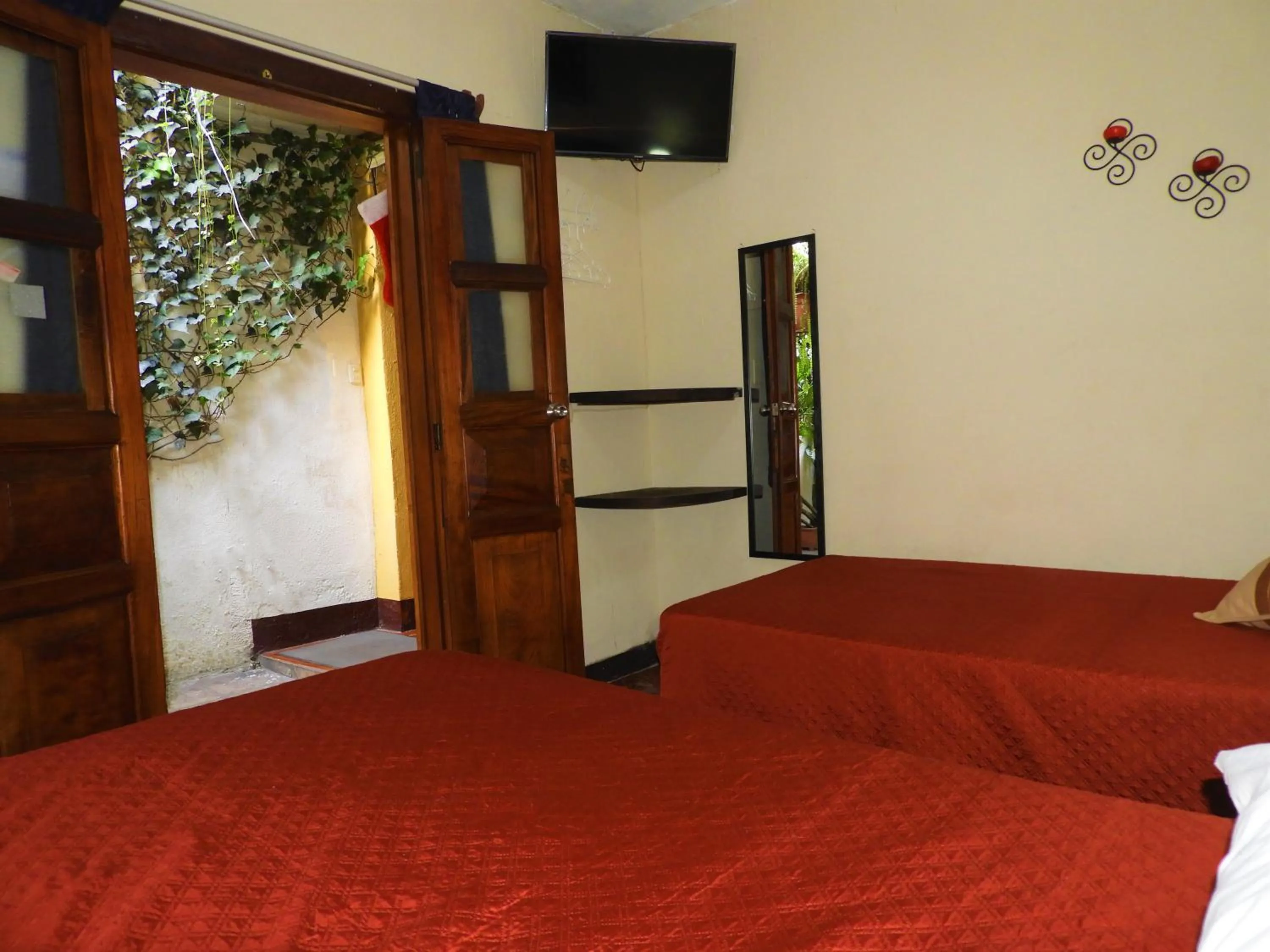 Bed in Hostal Antigua