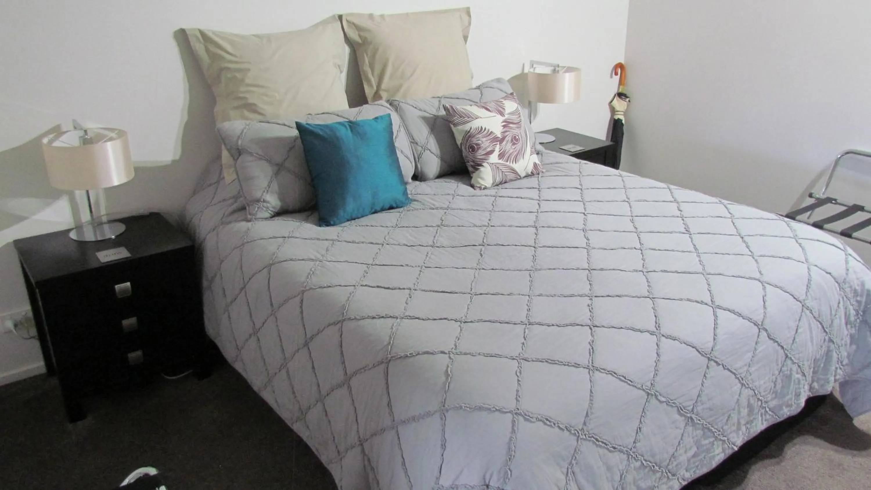 Bed in Tongariro Suites