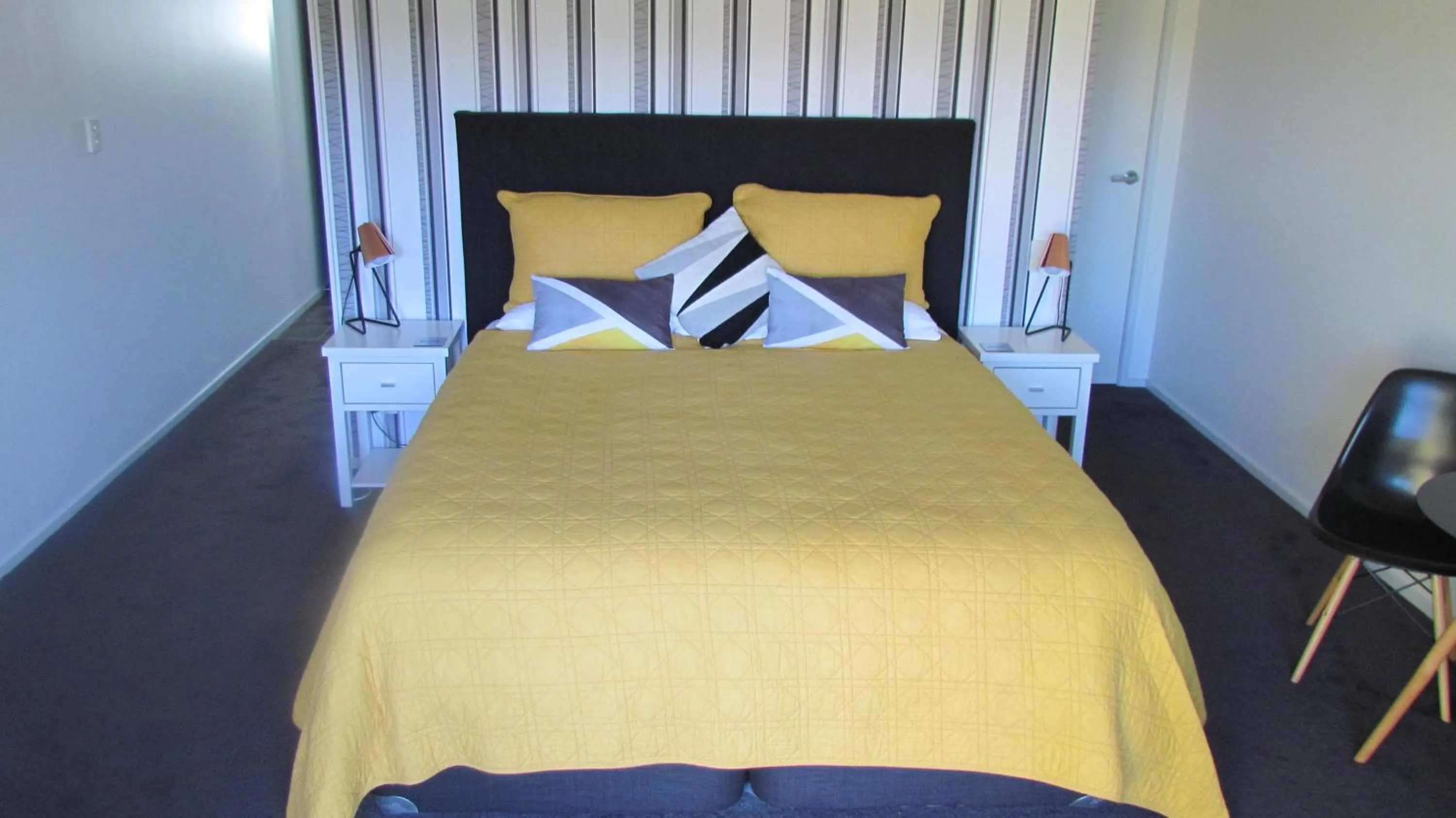 Bed in Tongariro Suites