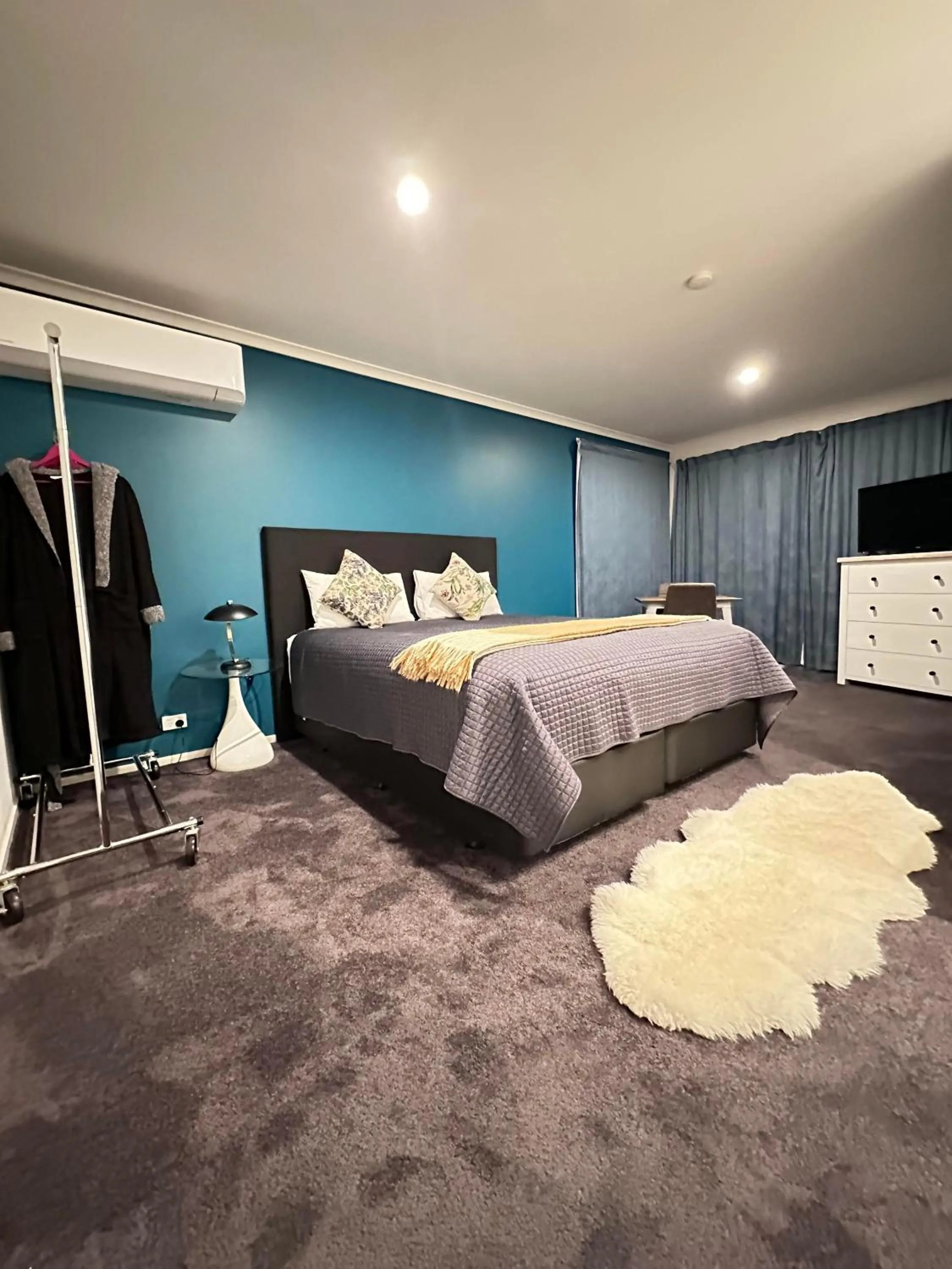 Bed in Tongariro Suites