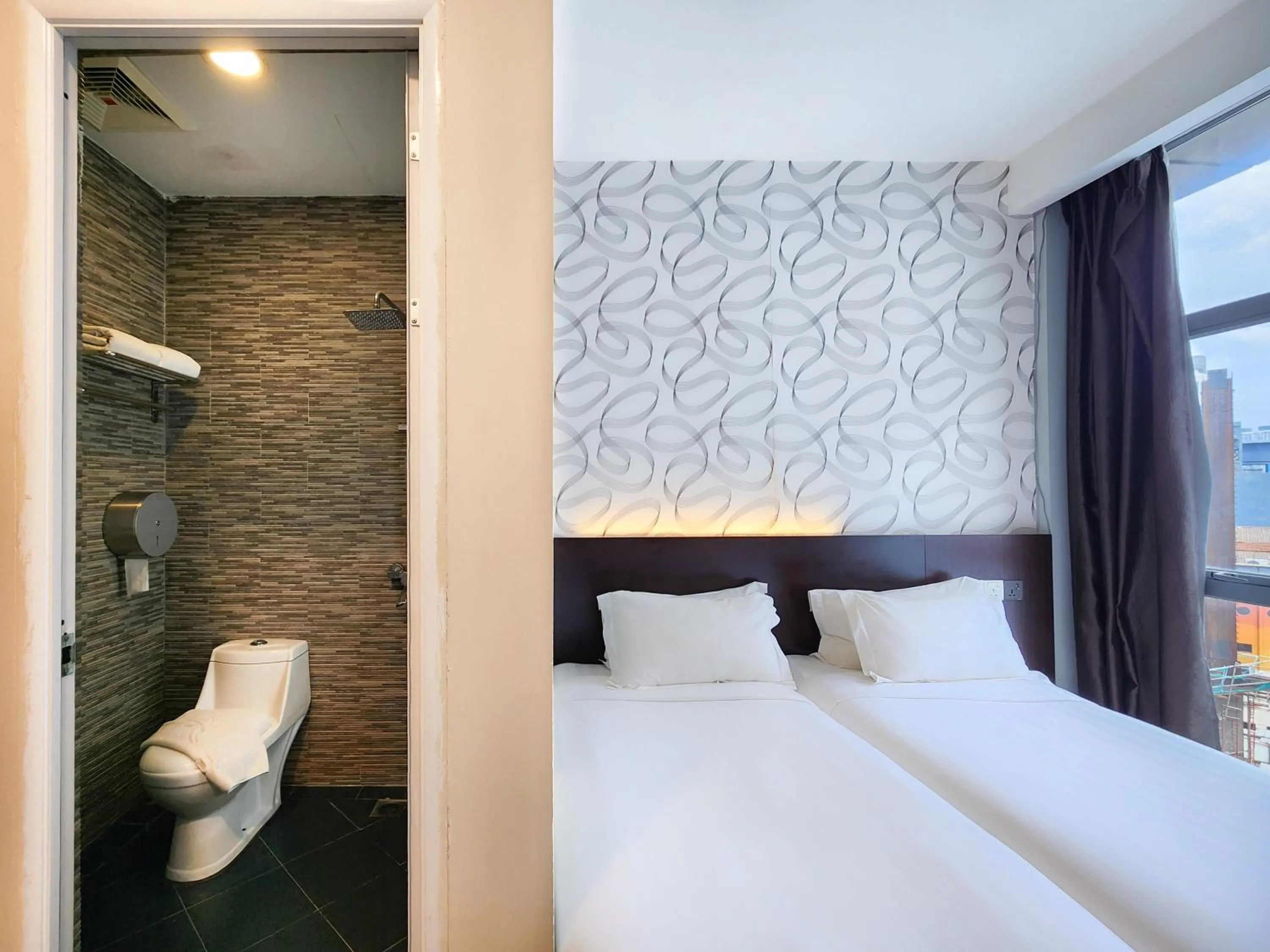 Bed in Izumi Hotel Bukit Bintang Kuala Lumpur