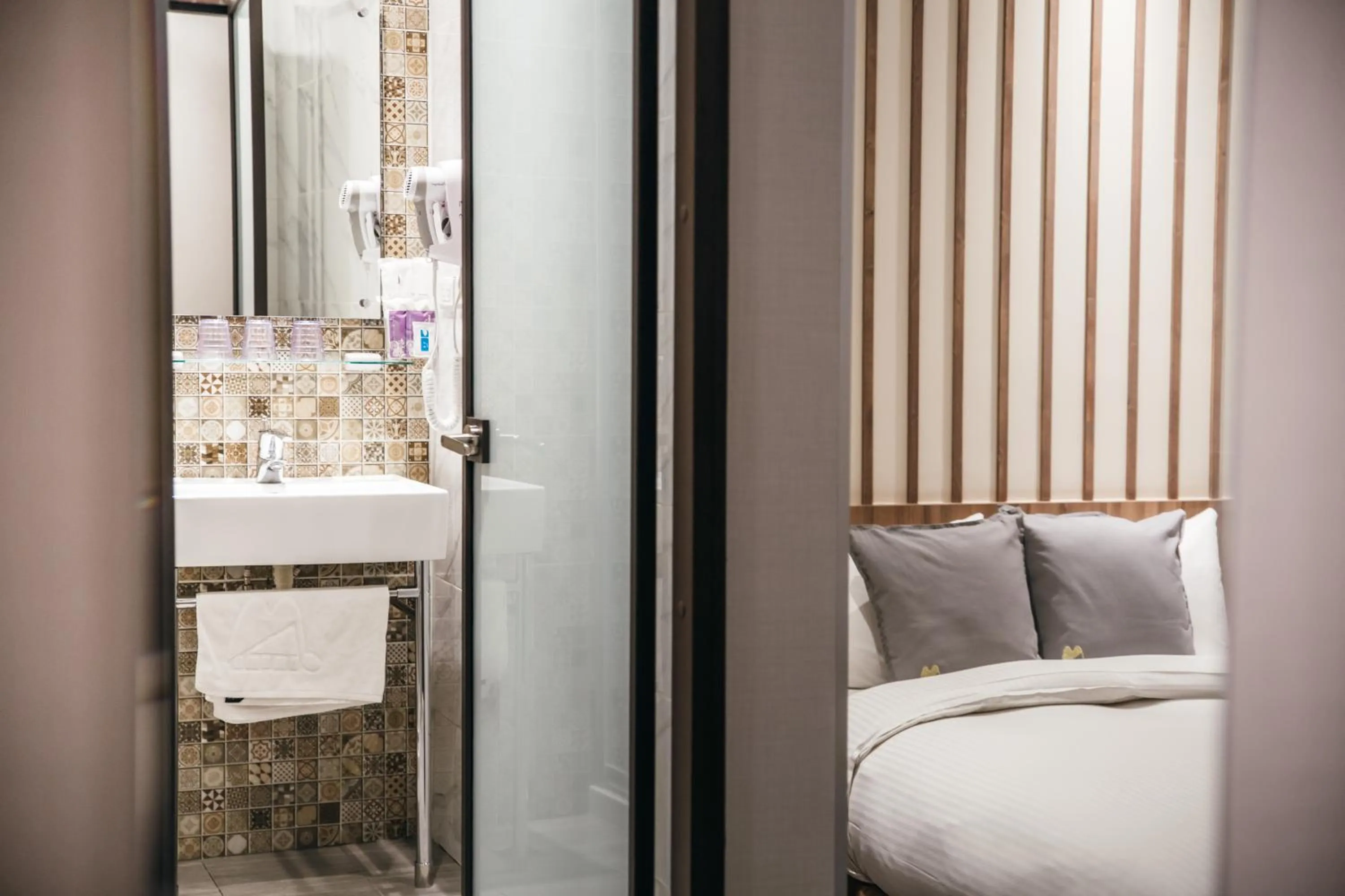 Decorative detail, Bed in Muzik Hotel - Ximending Xining Branch