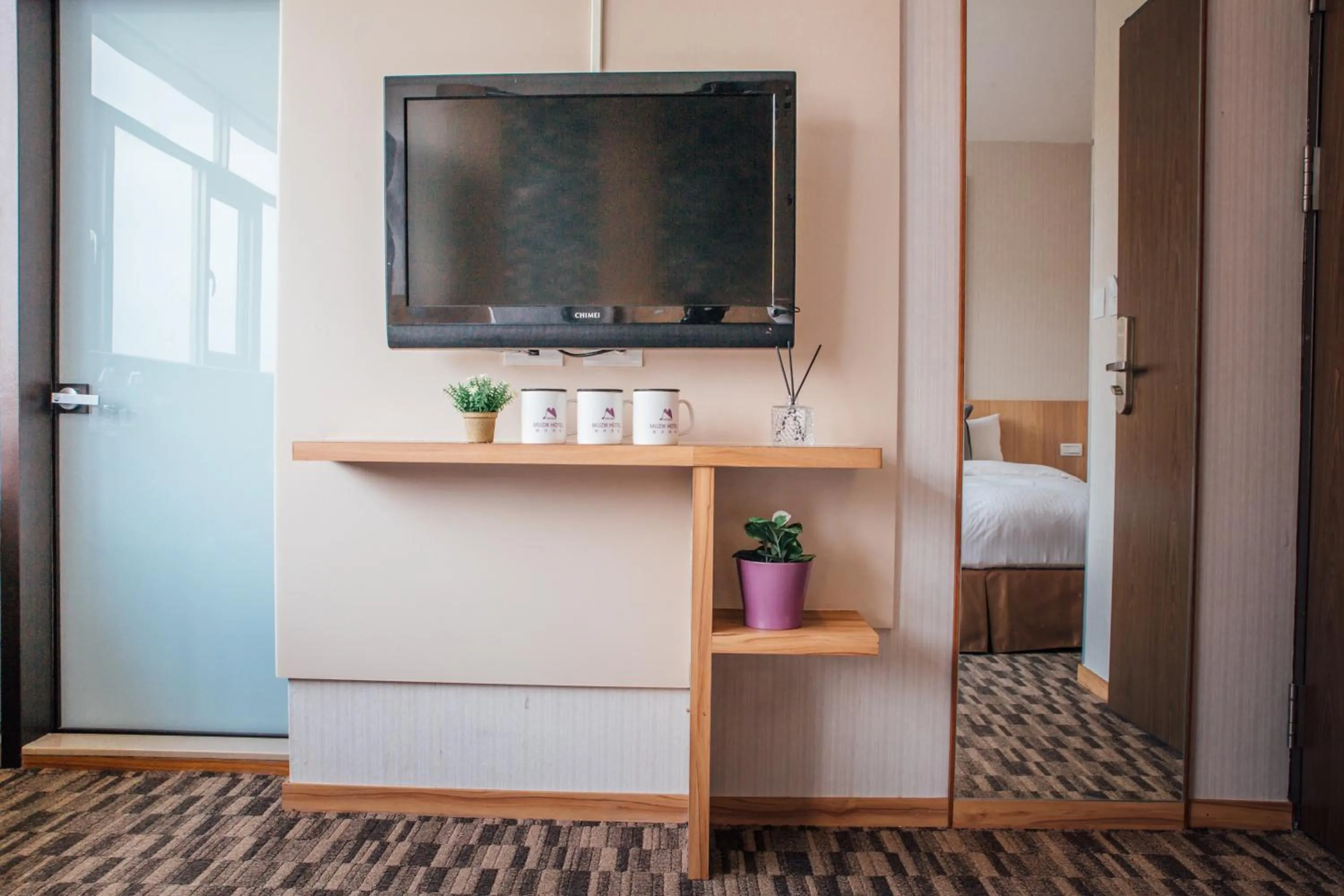 Photo of the whole room, Bed in Muzik Hotel - Ximending Xining Branch