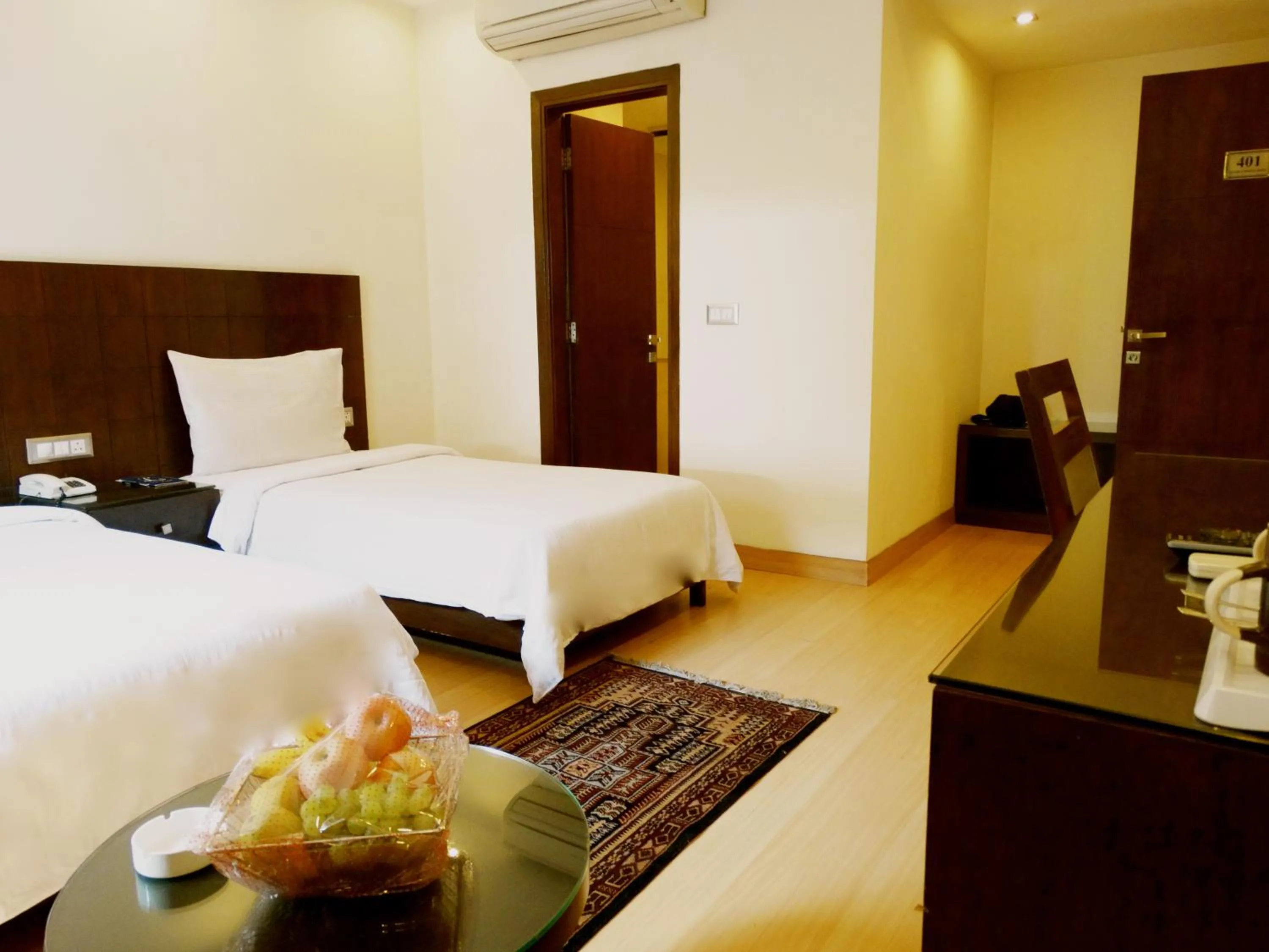 Bedroom in The Legend Inn Delhi