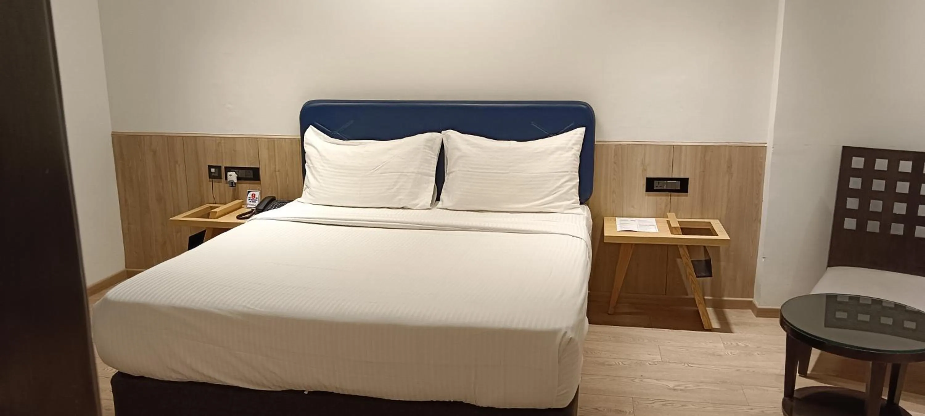 Bed in The Legend Inn Delhi