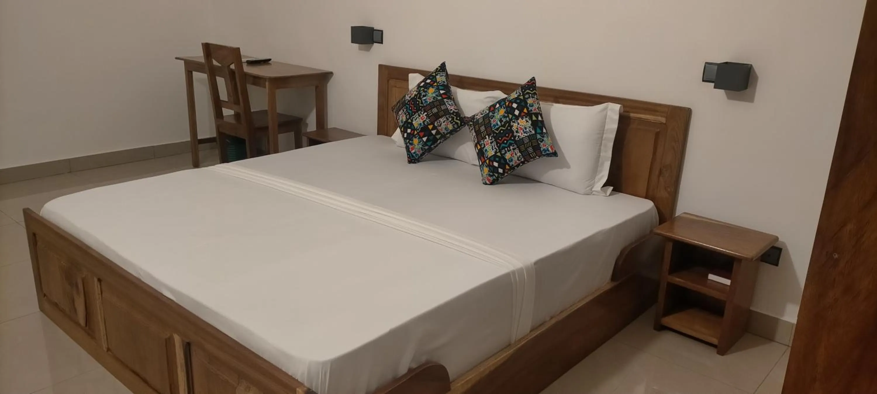 Bed in AZURIA HOTEL
