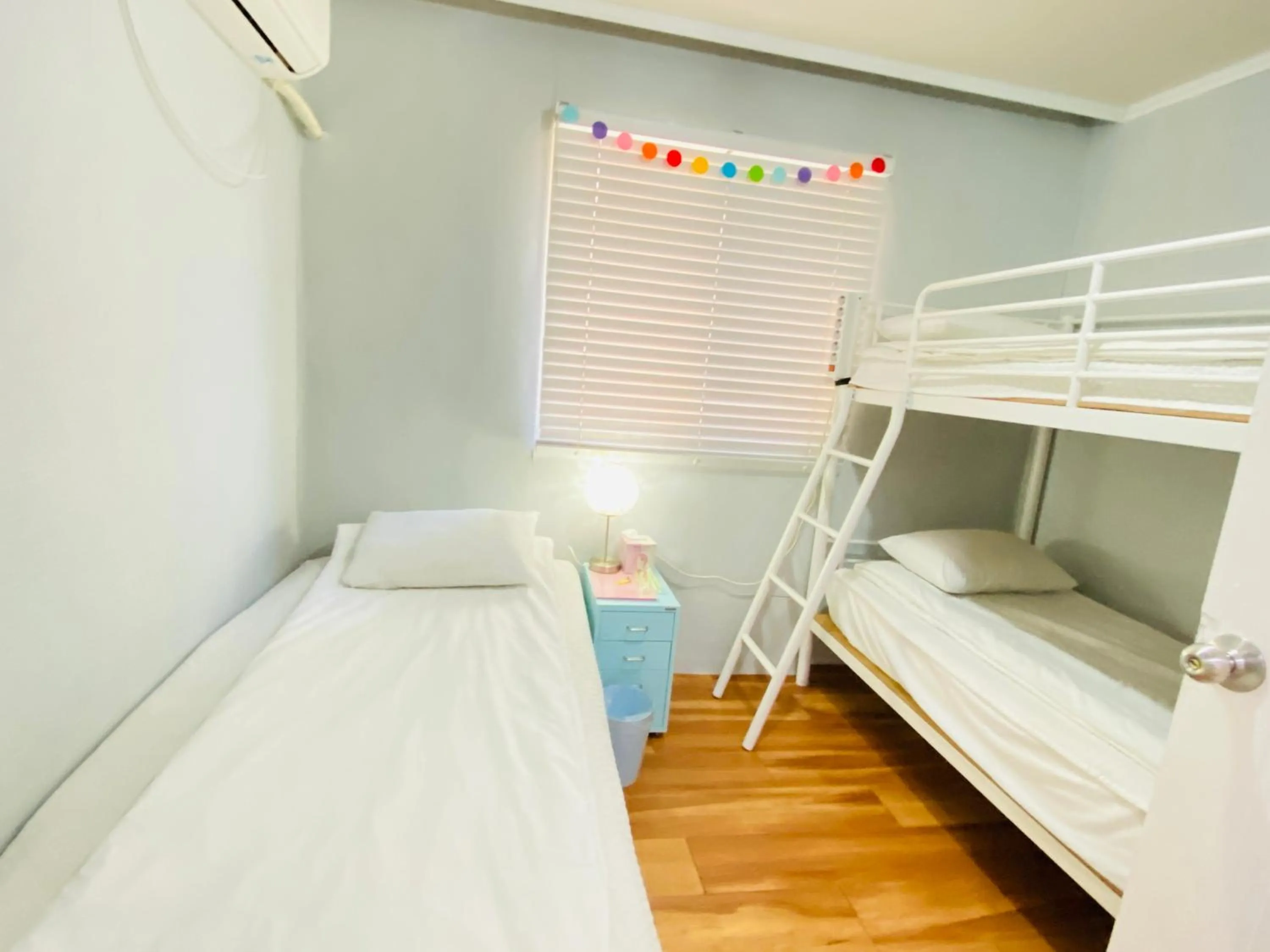 Photo of the whole room, Bed in Aroha Guesthouse Seoul Station