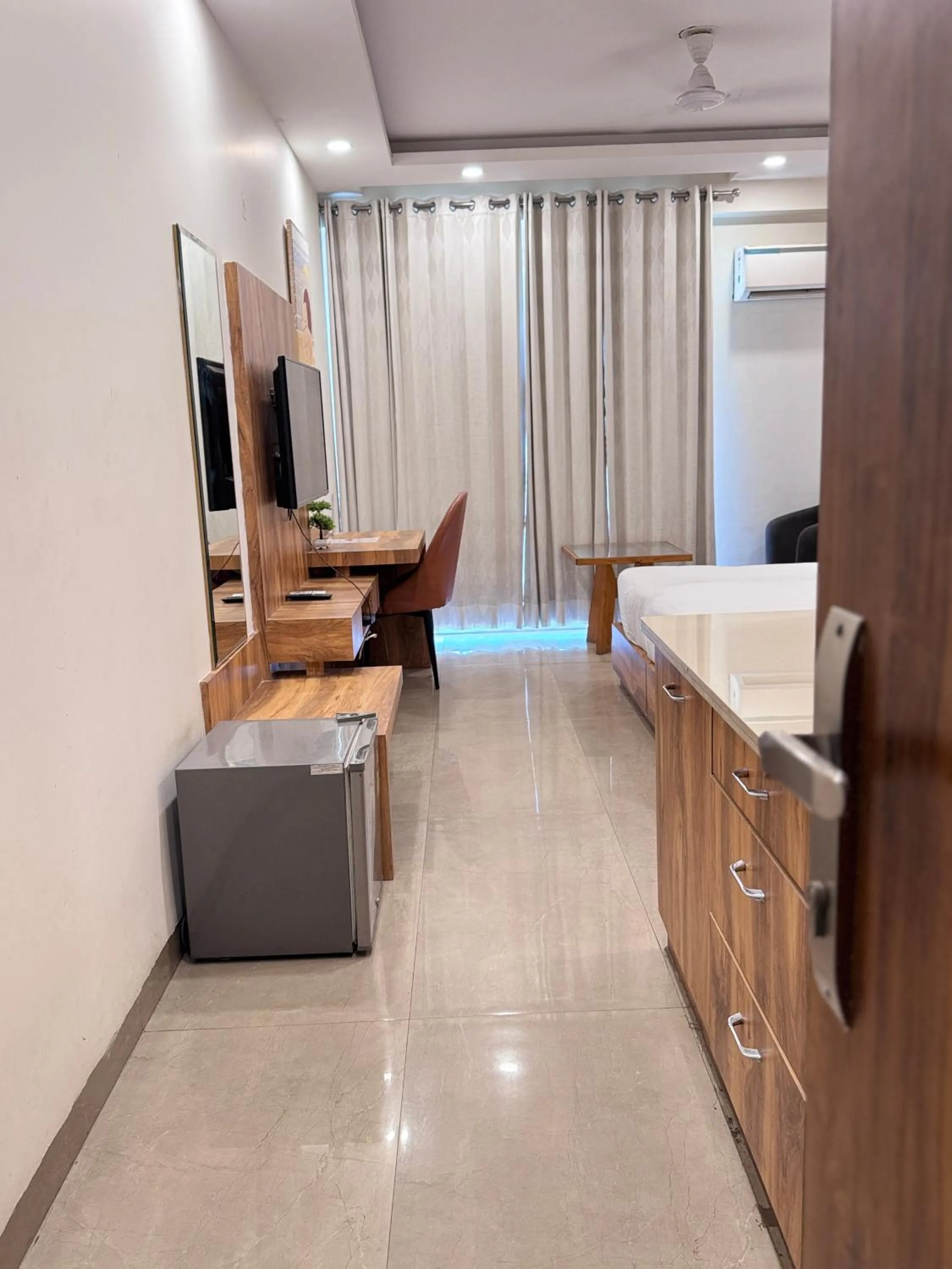 Bed in Hotel Golf View Suites-Golf Course Road Gurgaon