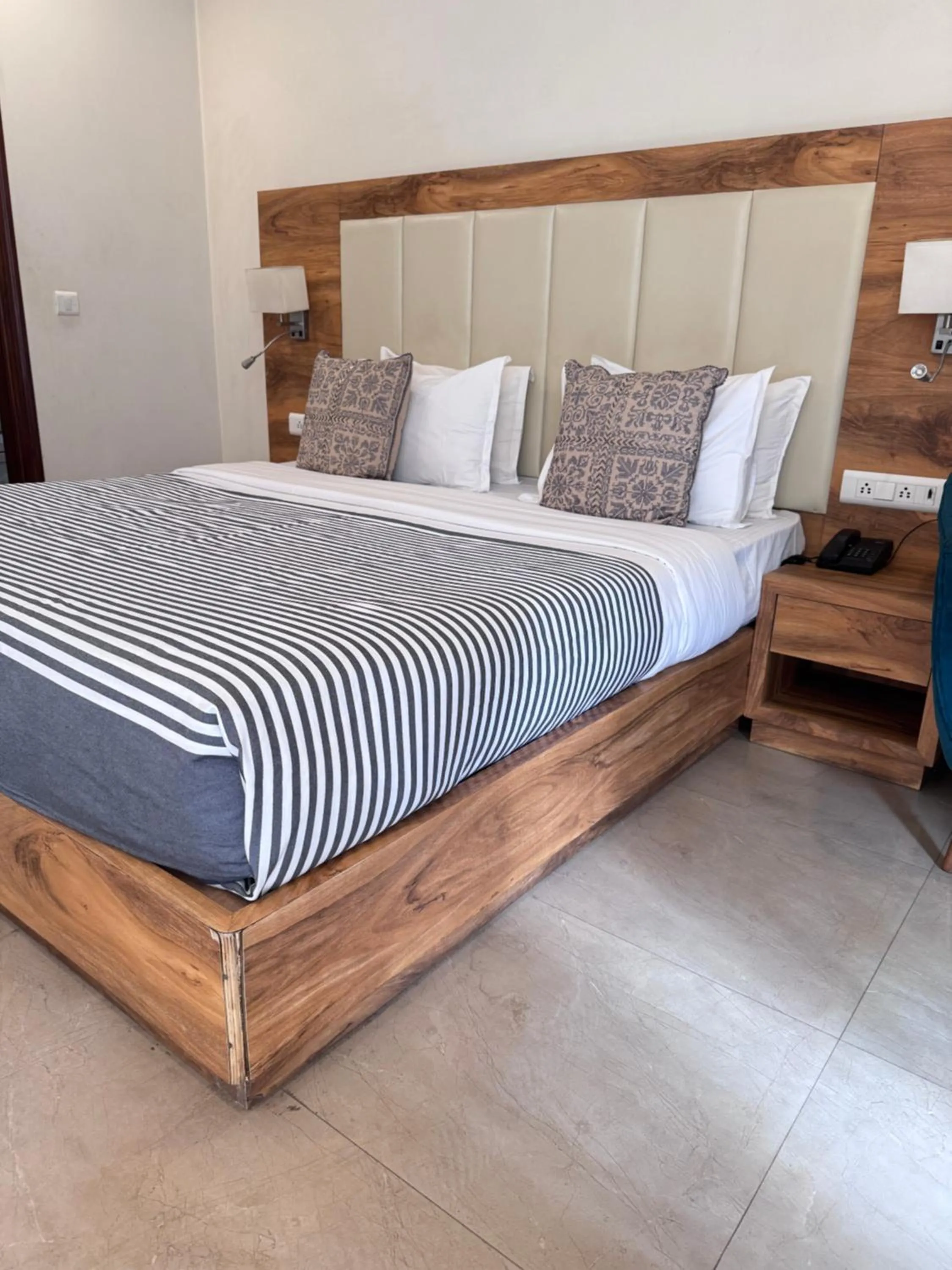 Bed in Hotel Golf View Suites-Golf Course Road Gurgaon