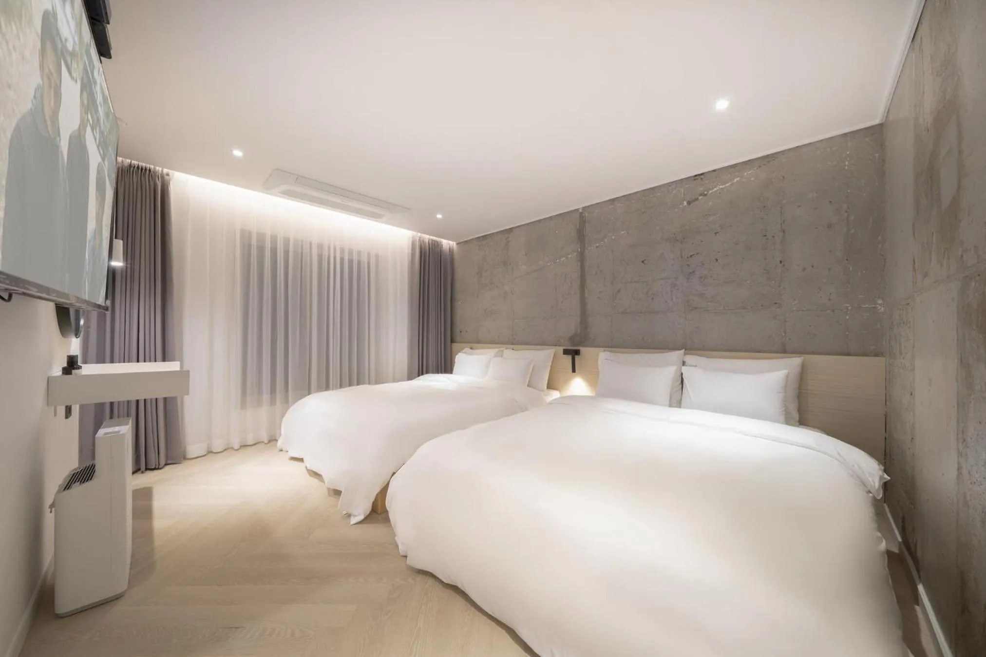 Bed in Croissant Hotel Guri by Aank