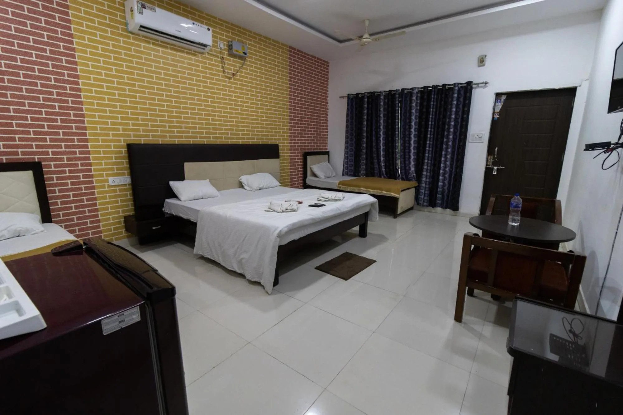Photo of the whole room, Bed in Vrindavan Gopala Resort