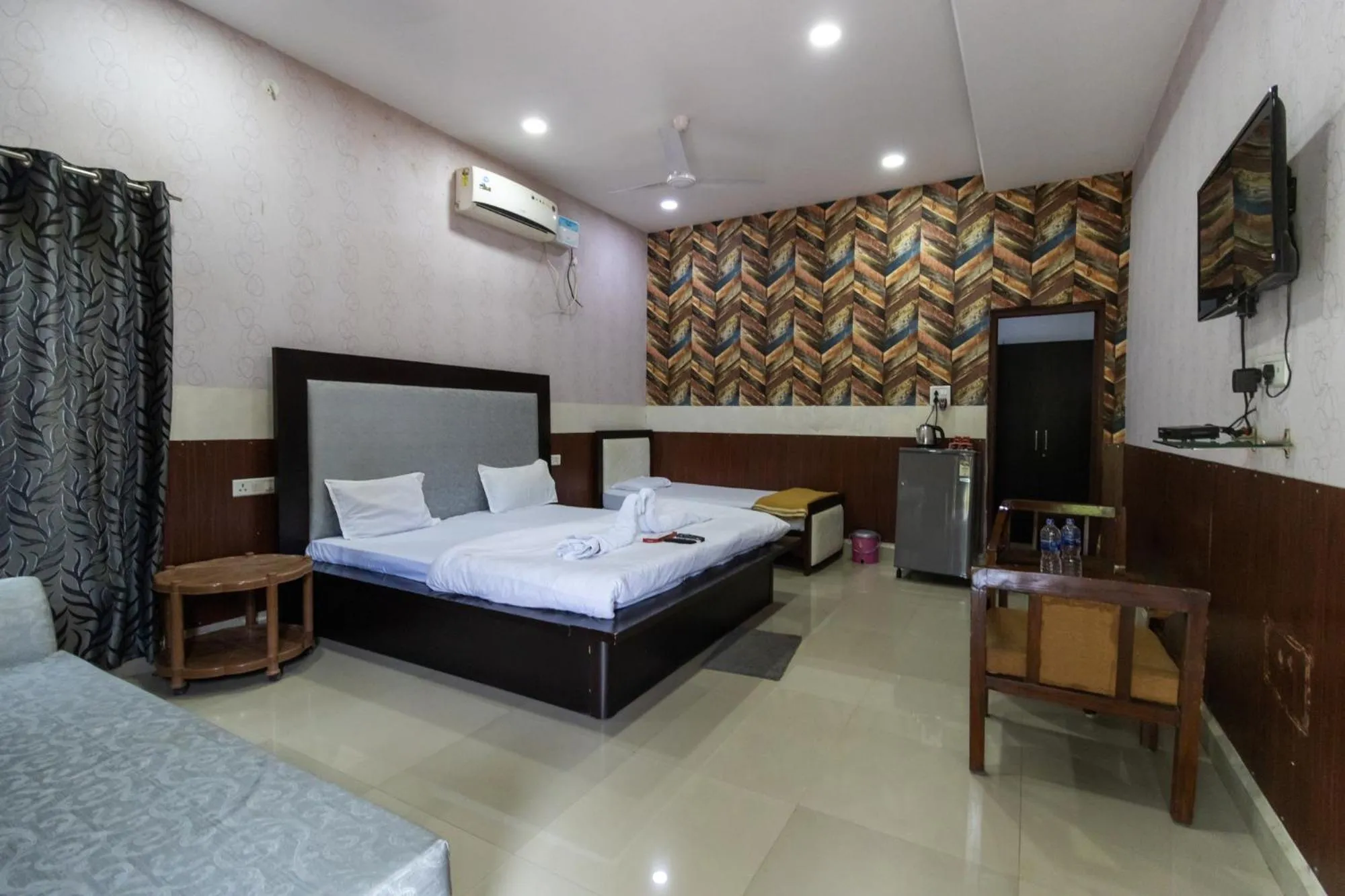Photo of the whole room, Bed in Vrindavan Gopala Resort