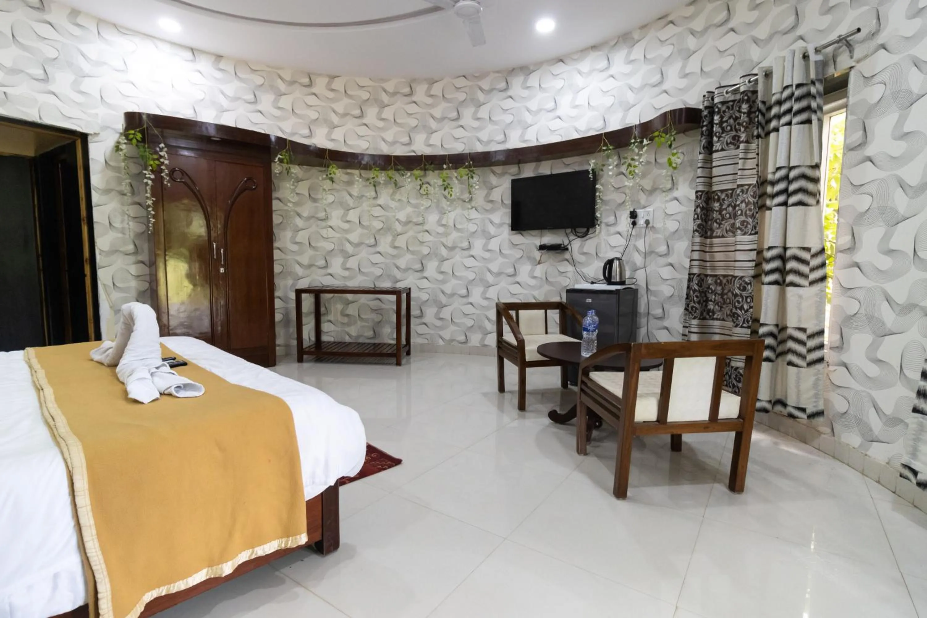 Photo of the whole room, Bed in Vrindavan Gopala Resort
