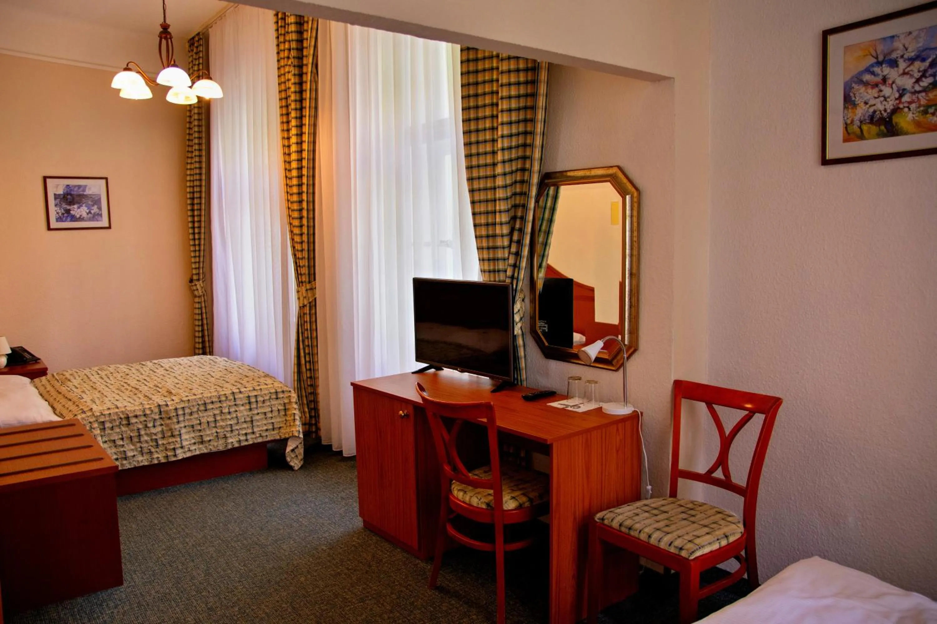Photo of the whole room, Bed in EA Hotel Mozart