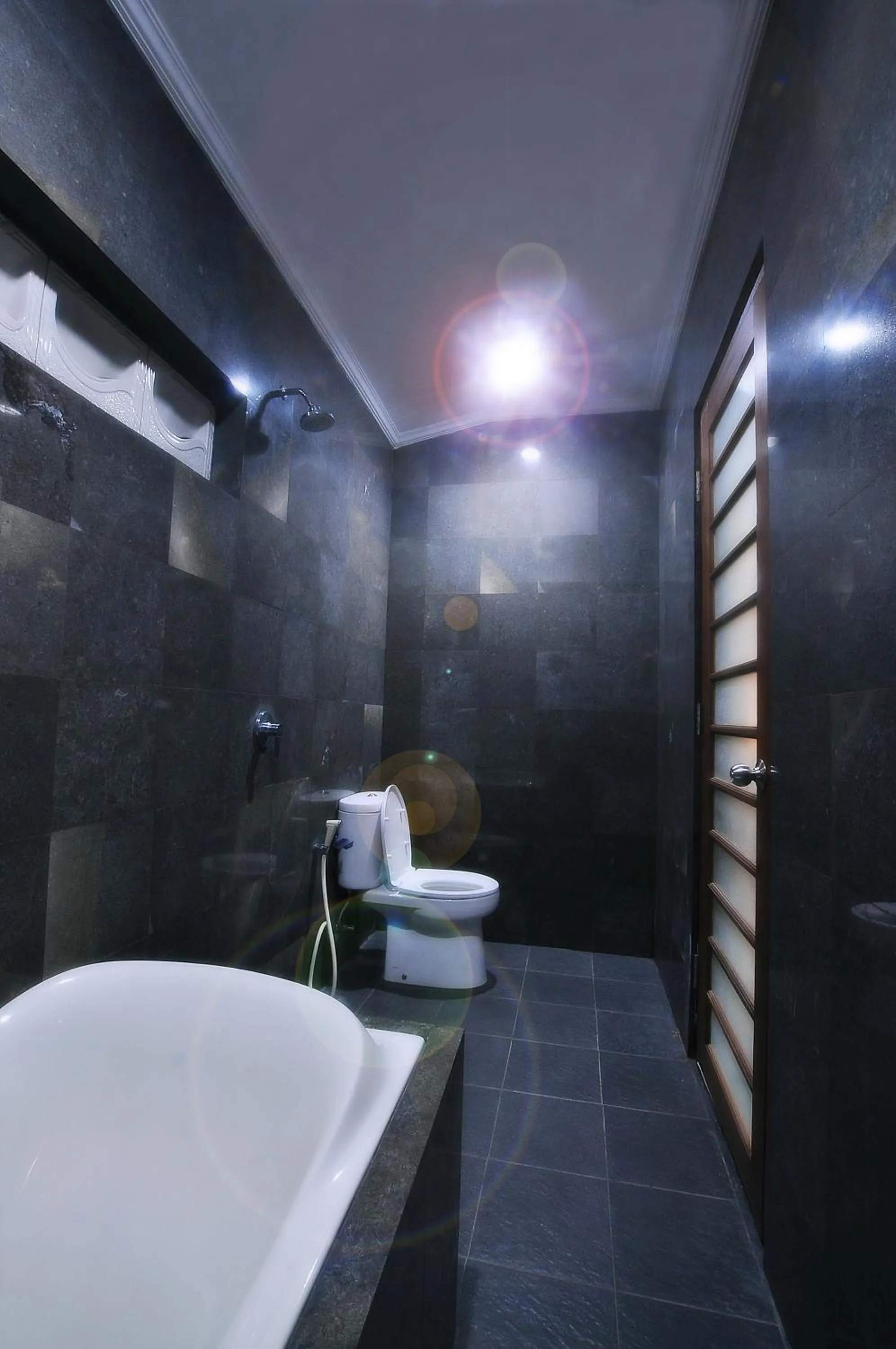 Bathroom in Swastika Guesthouse Sanur