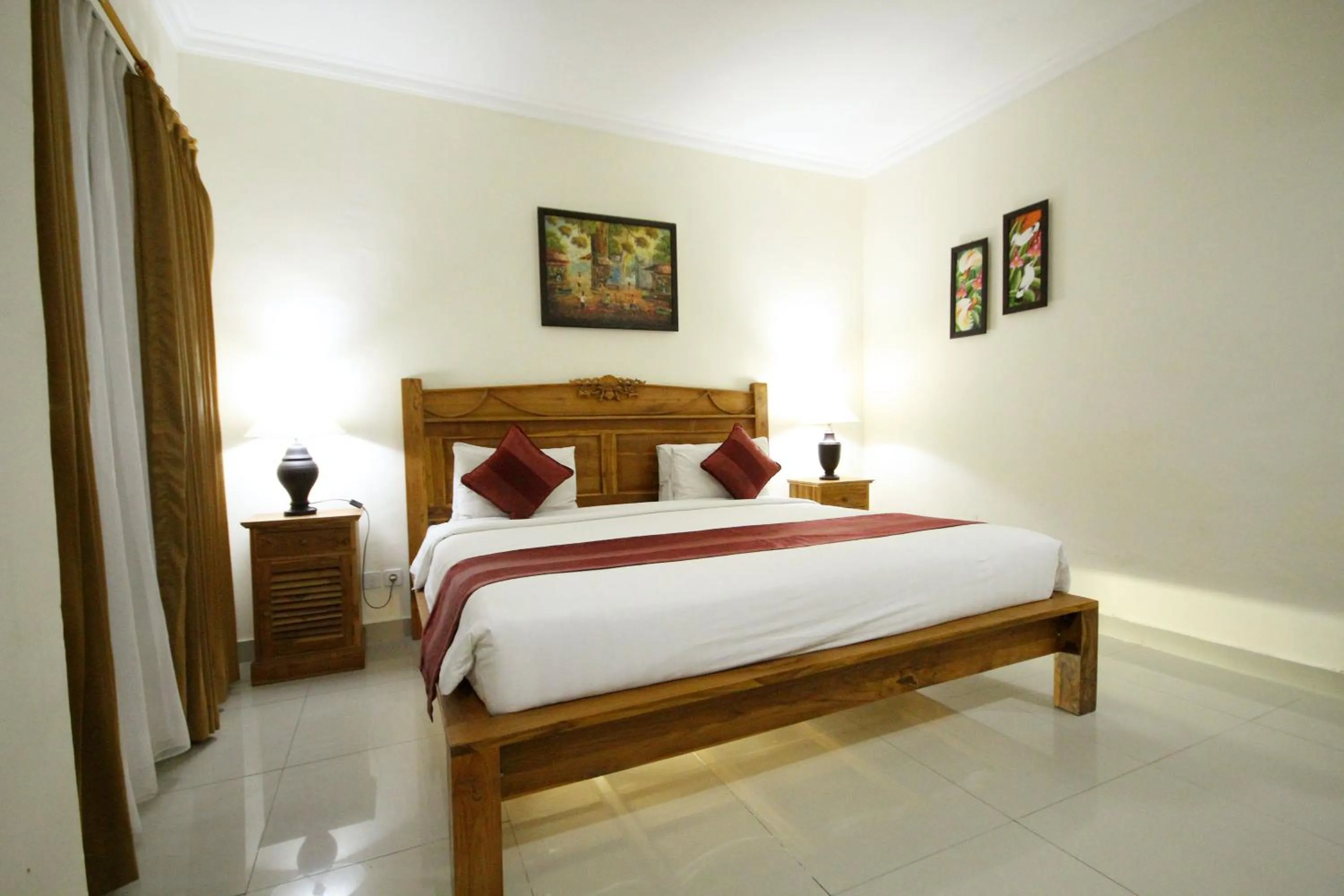 Bed in Swastika Guesthouse Sanur