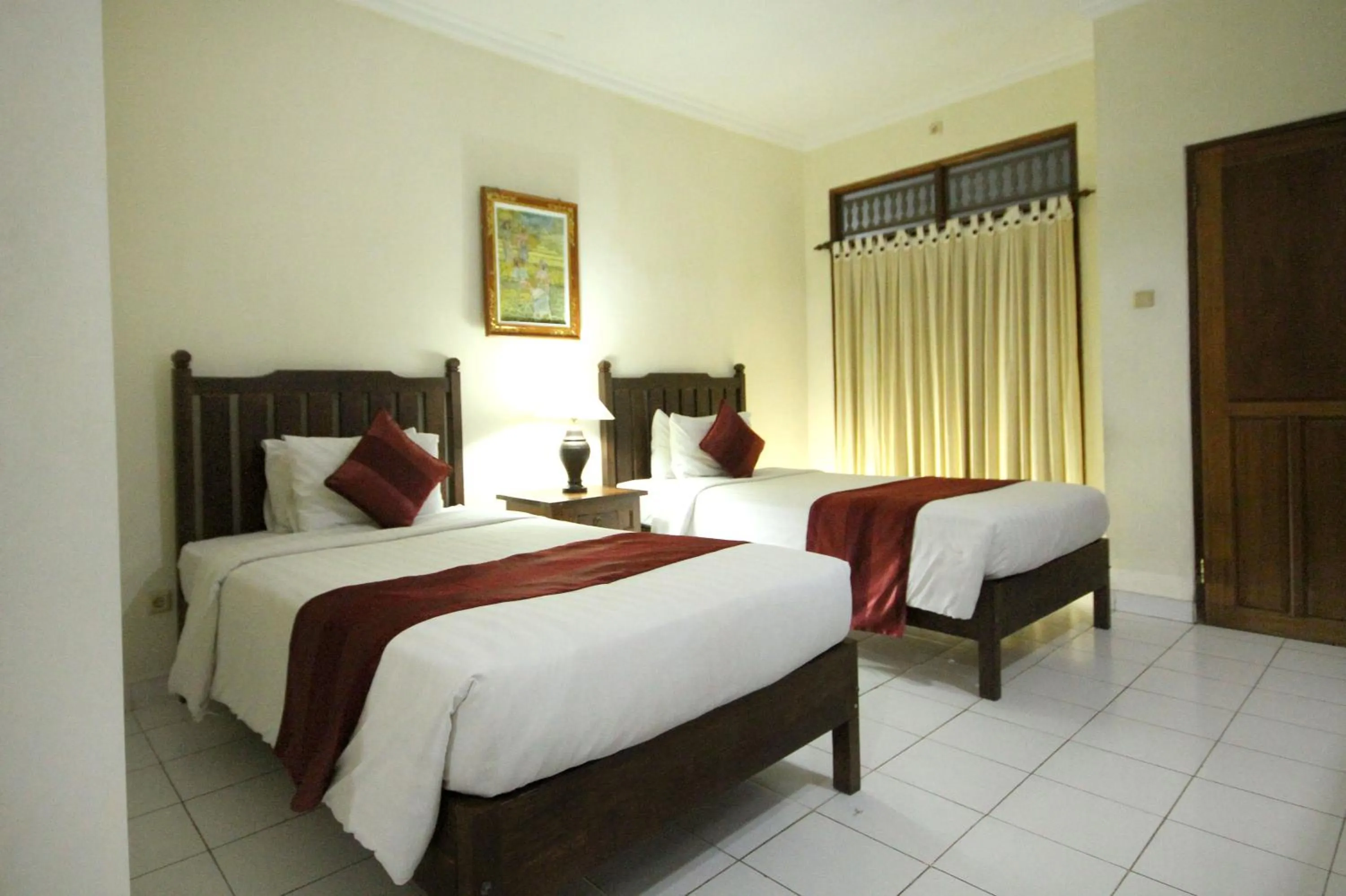 Bedroom, Bed in Swastika Guesthouse Sanur
