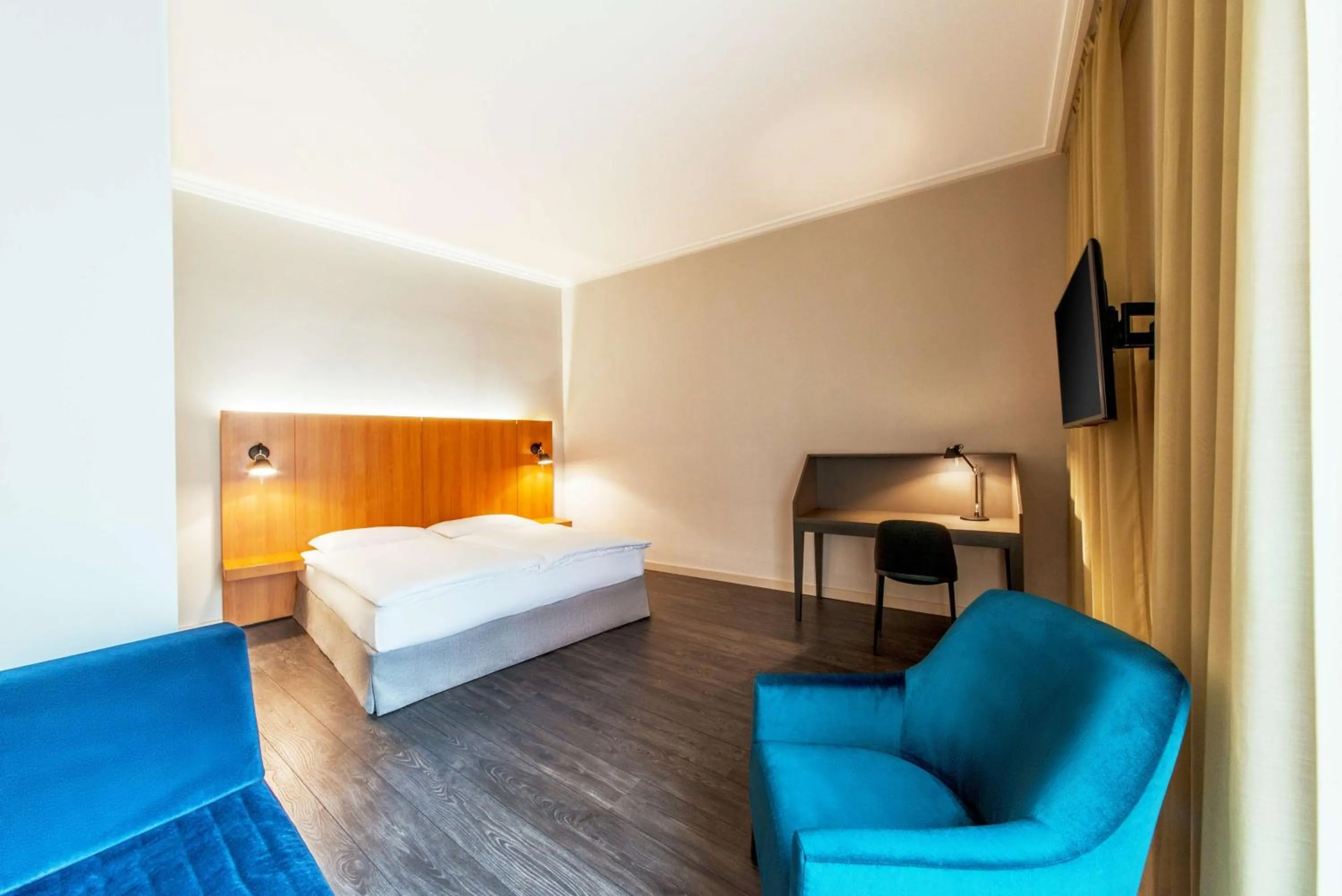 Living room, Bed in NH Prague City