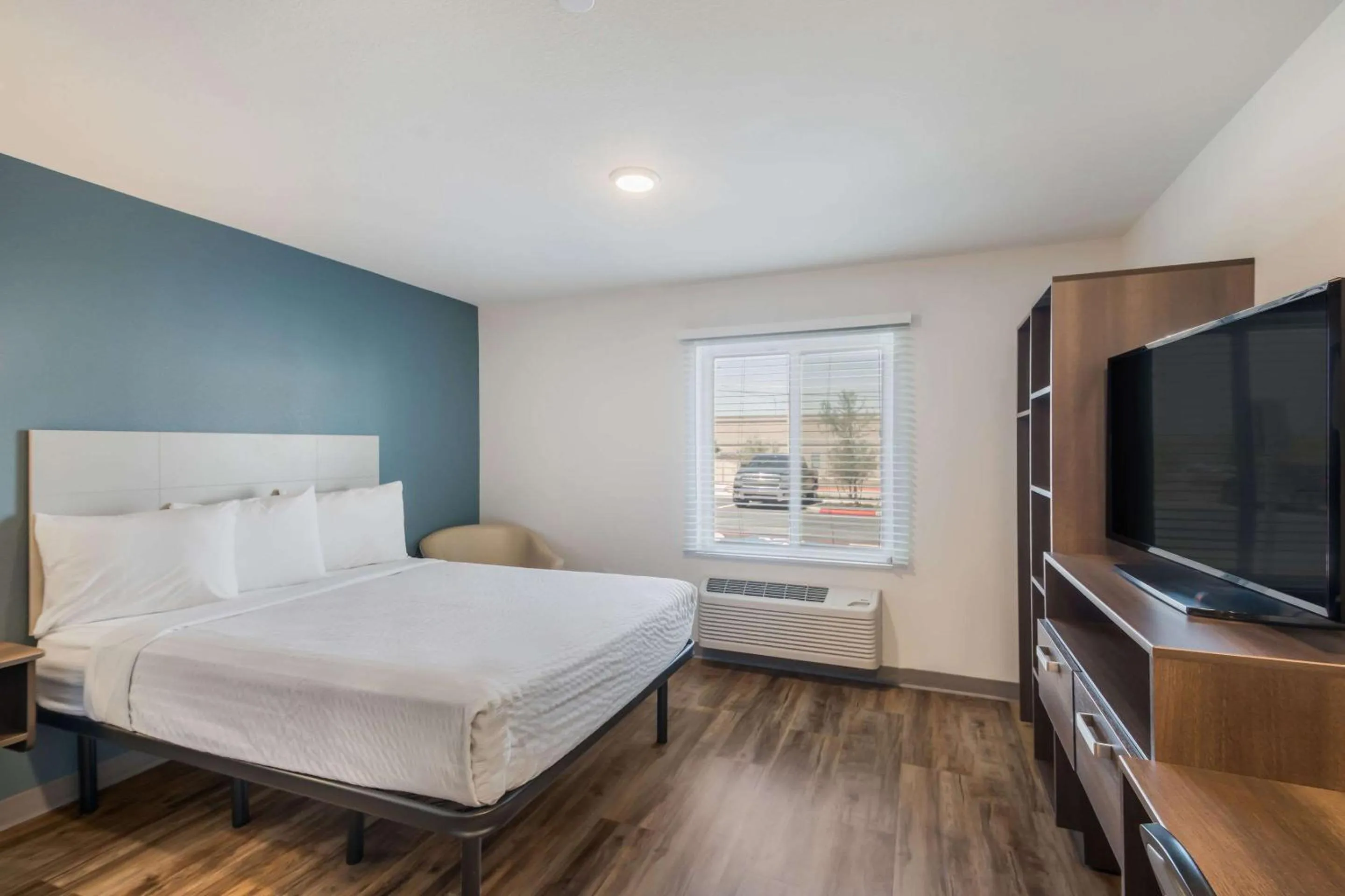 Bedroom, Bed in WoodSpring Suites Round Rock-Austin North