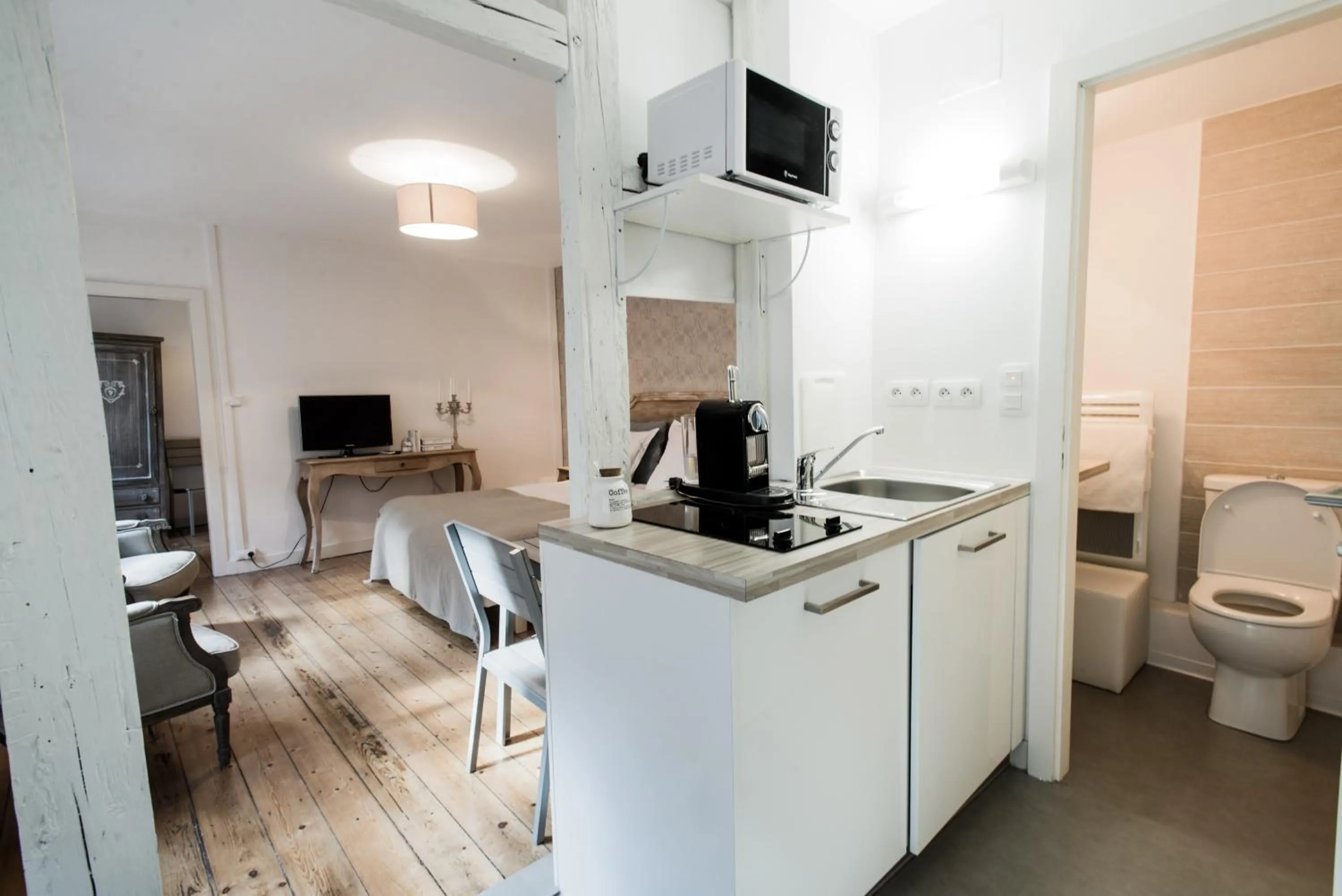Kitchen or kitchenette in Appartements Orfèvres Cathédrale