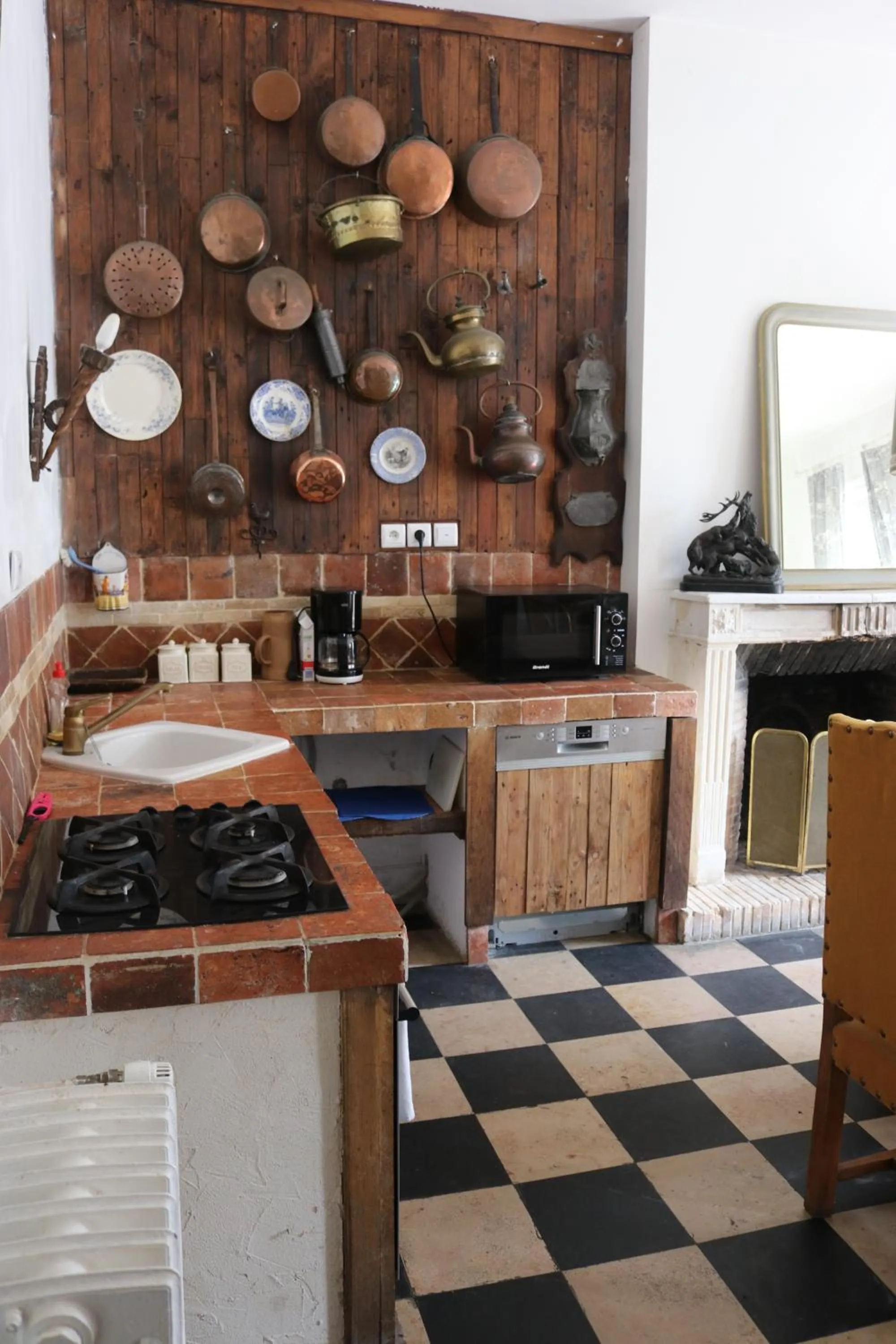 fireplace in Maison d'hôtes Moulin du Bas Pesé