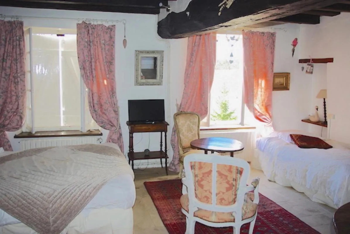 Bed in Maison d'hôtes Moulin du Bas Pesé