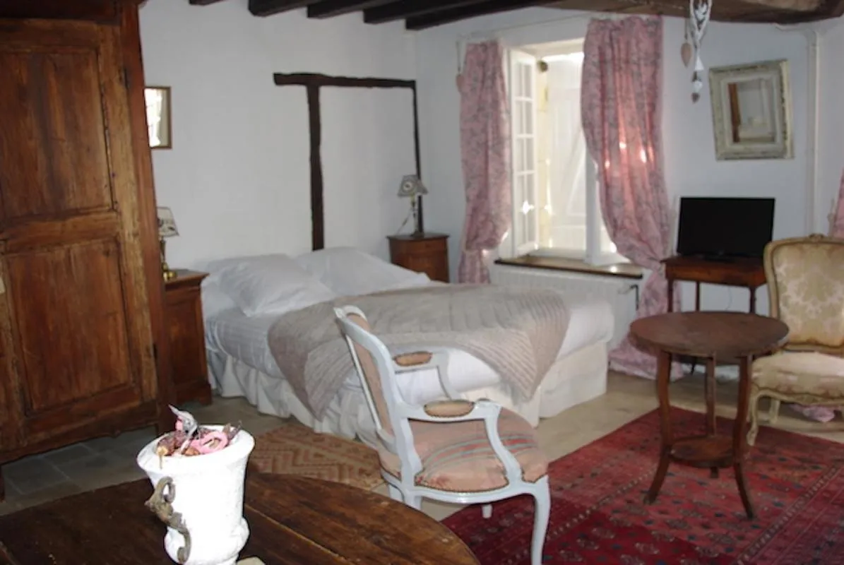 Bed in Maison d'hôtes Moulin du Bas Pesé