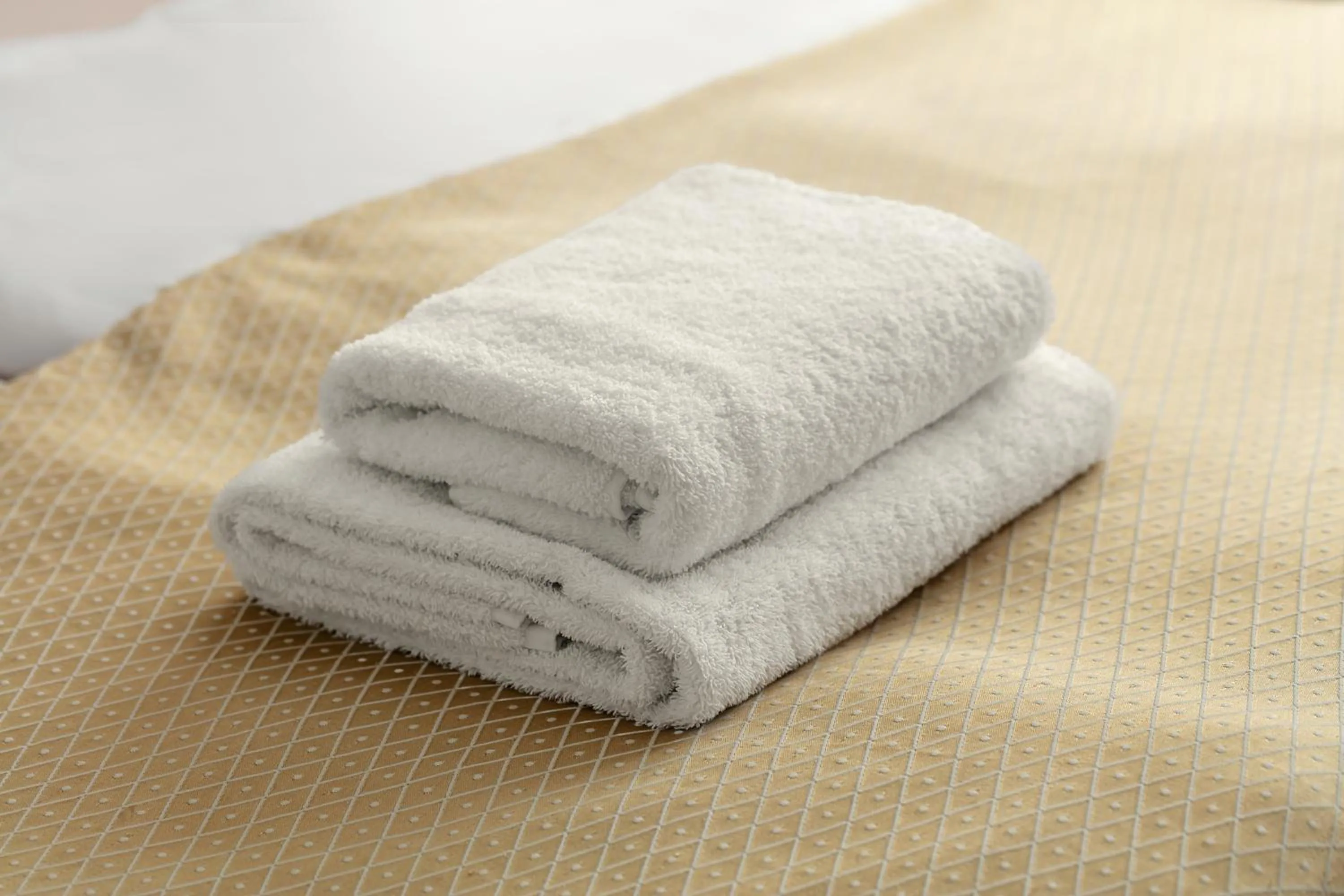 towels, Bed in Hotel Superior Prague