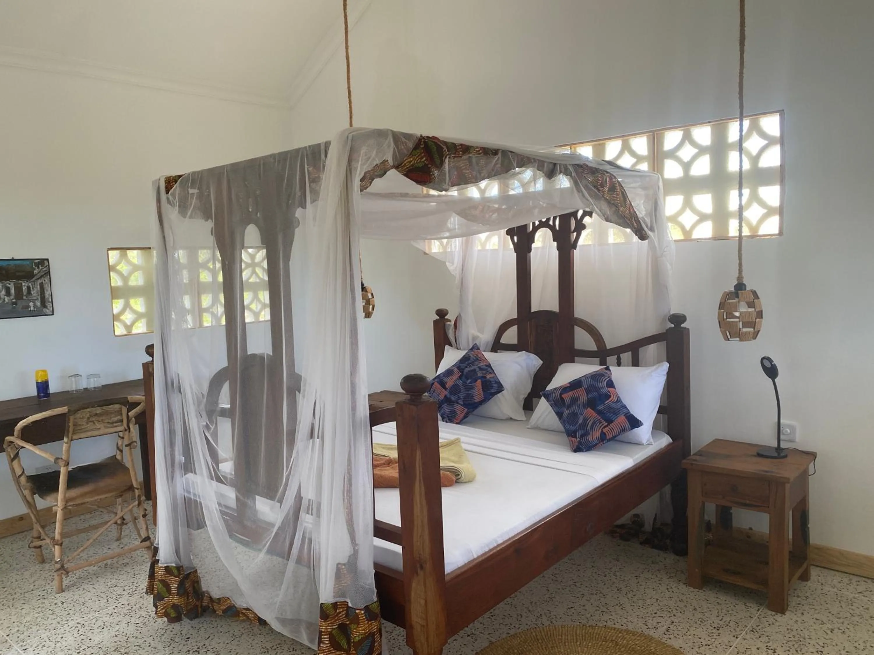 Bed in Mbuyuni Beach Village