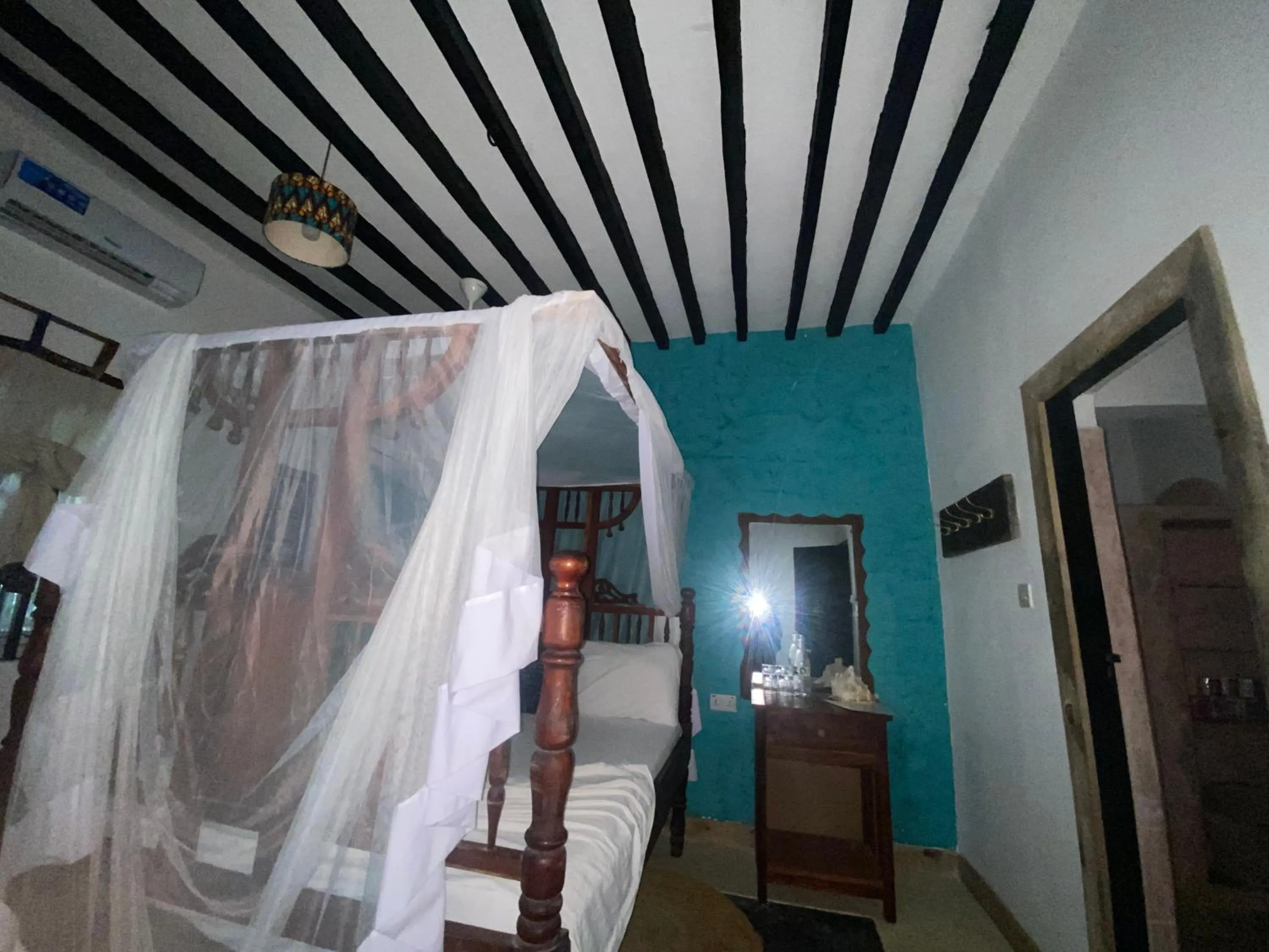 Bed in Mbuyuni Beach Village