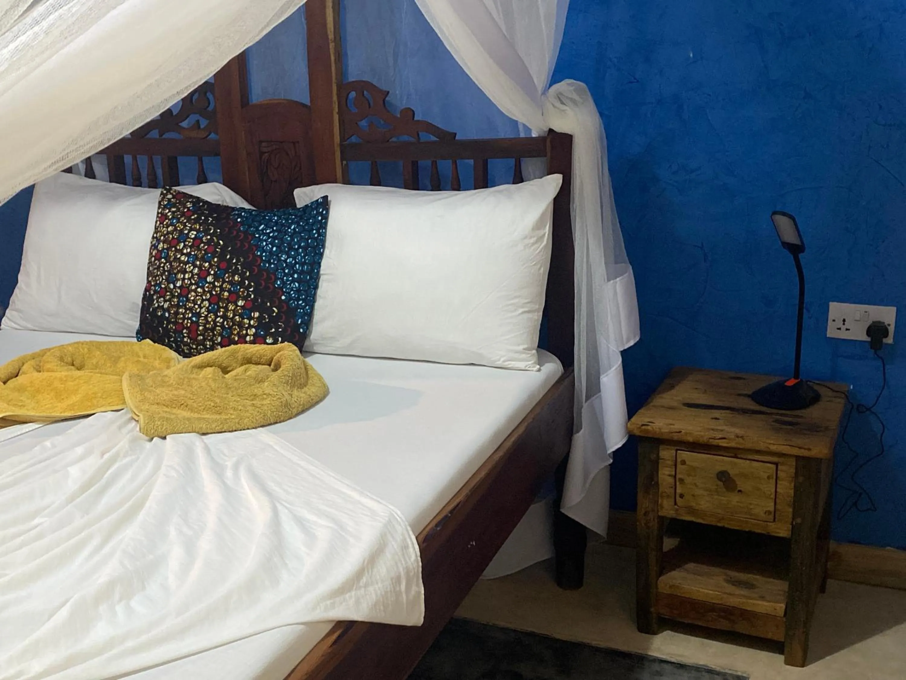 Bed in Mbuyuni Beach Village