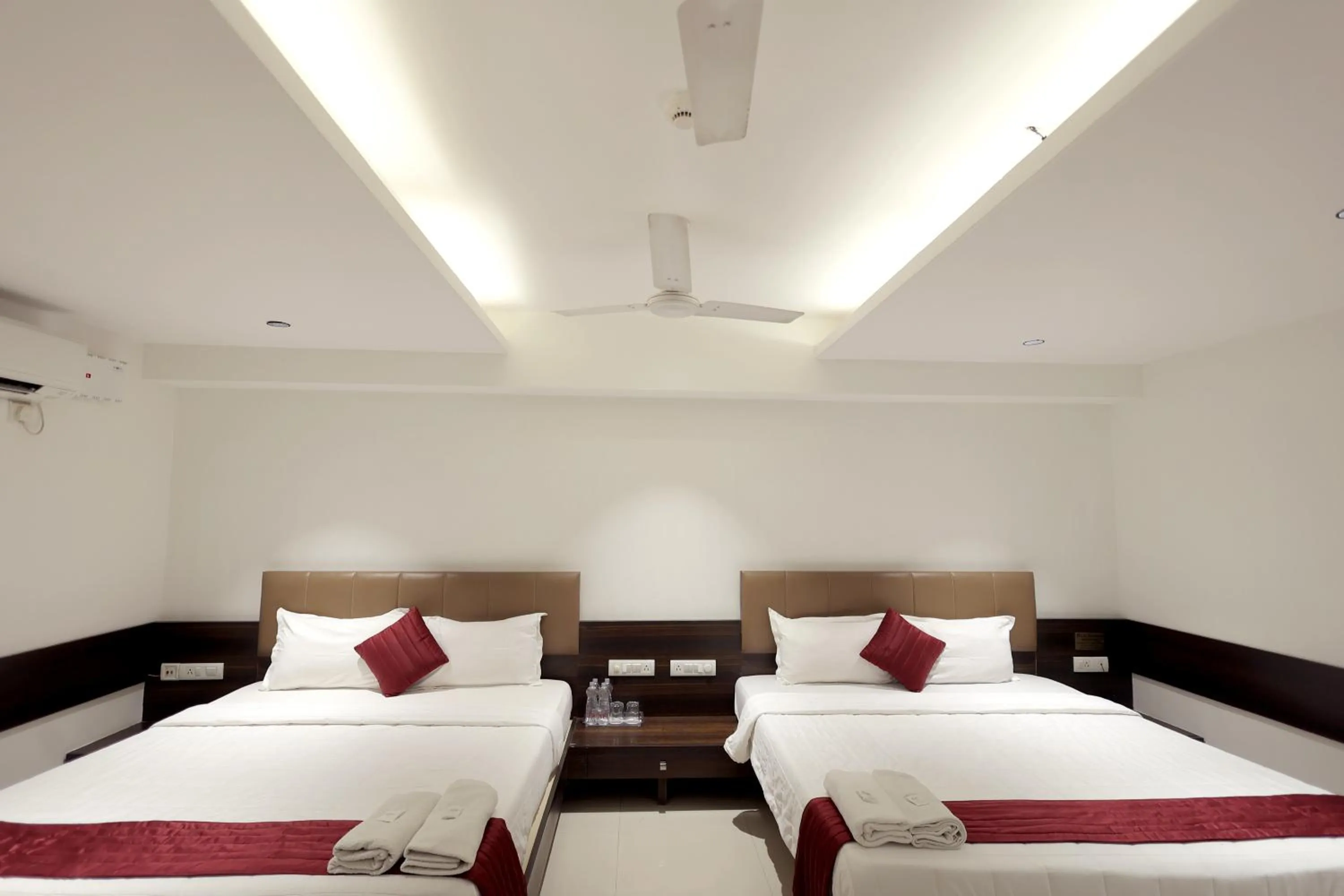 Photo of the whole room, Bed in Hotel Shagun, Piplod City Centre Surat